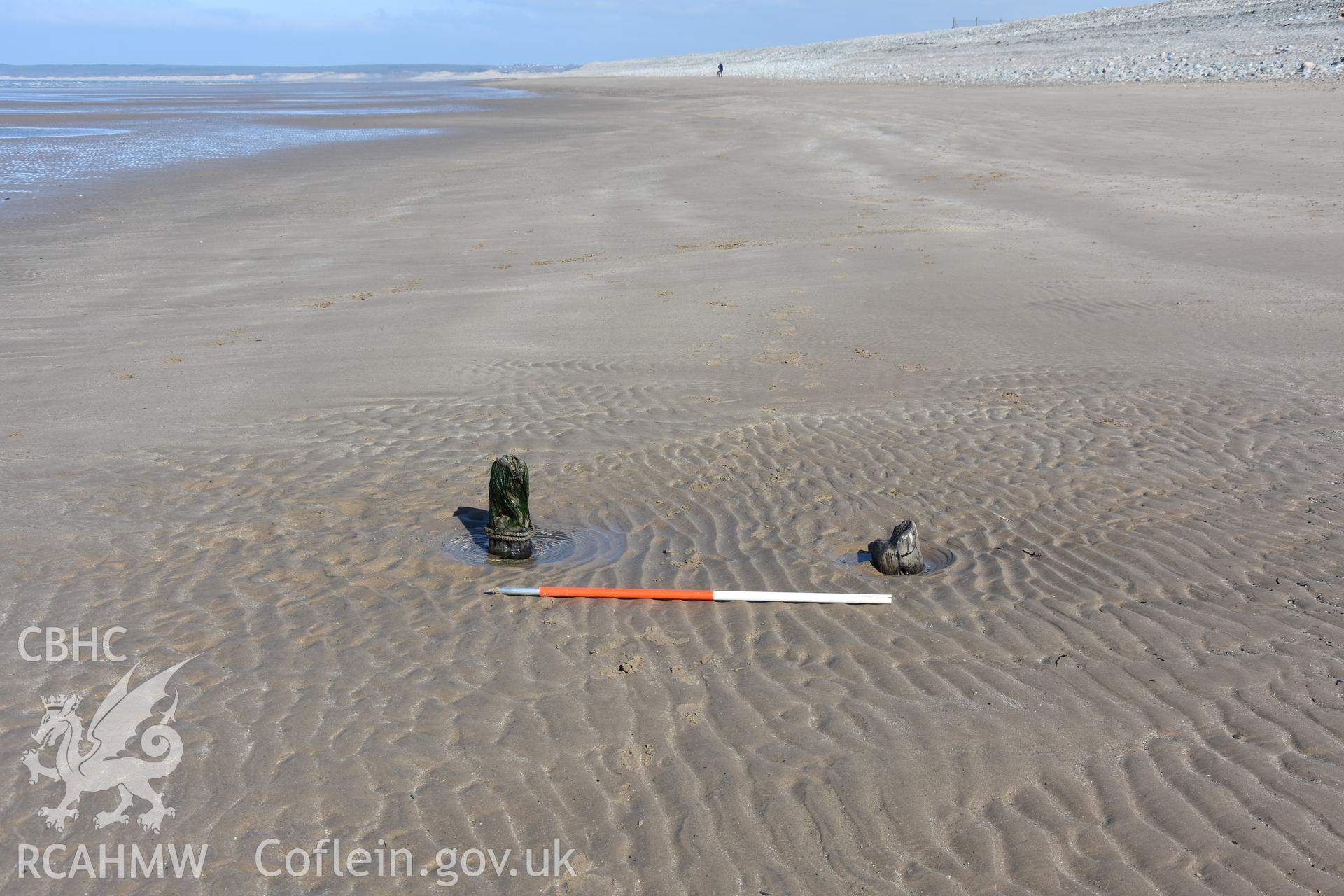 Wide shot of part of a wreck with 2m scale. Photograph taken by Toby Driver in March 2019 as part of repeat monitoring and survey by the CHERISH project. © Crown: CHERISH PROJECT 2019. Produced with EU funds through the Ireland Wales Co-operation Programme 2014-2023. All material made freely available through the Open Government Licence.
