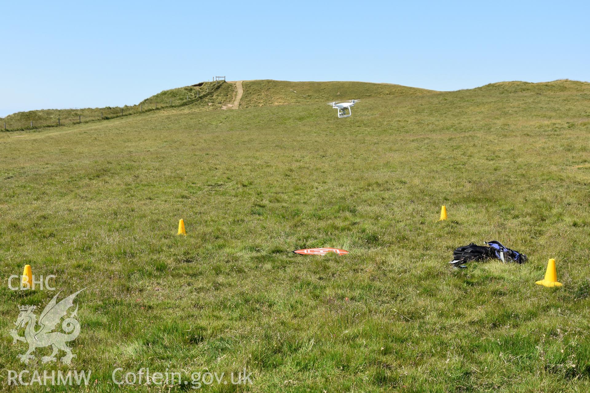 Drone taking off for survey in central enclosure. Taken by Daniel Hunt. Produced with EU funds through the Ireland Wales Co-operation Programme 2014-2023. All material made freely available through the Open Government Licence.
