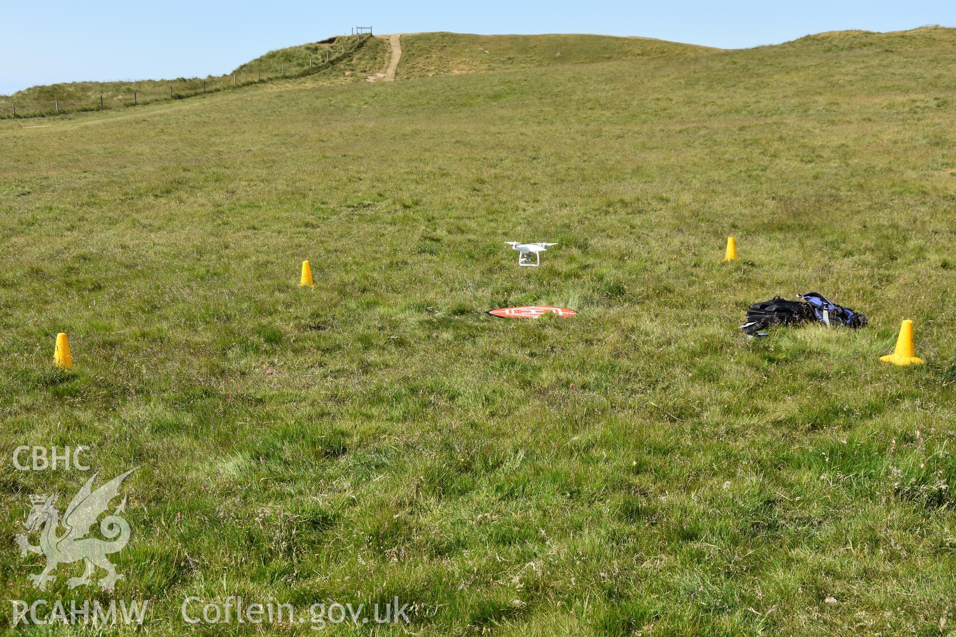 Drone taking off for survey in central enclosure. Taken by Daniel Hunt. Produced with EU funds through the Ireland Wales Co-operation Programme 2014-2023. All material made freely available through the Open Government Licence.