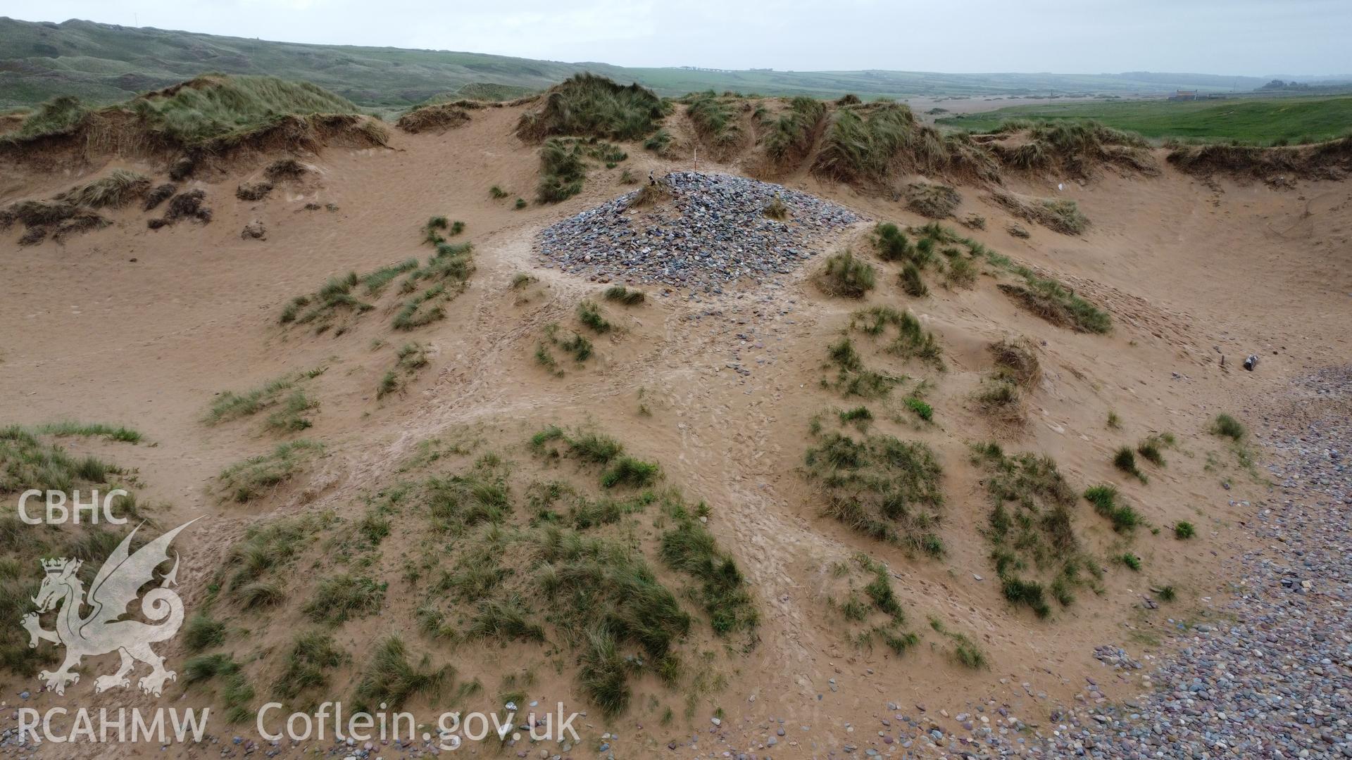 Dobby's Grave, oblique view, looking north-east with sand dunes in the background.