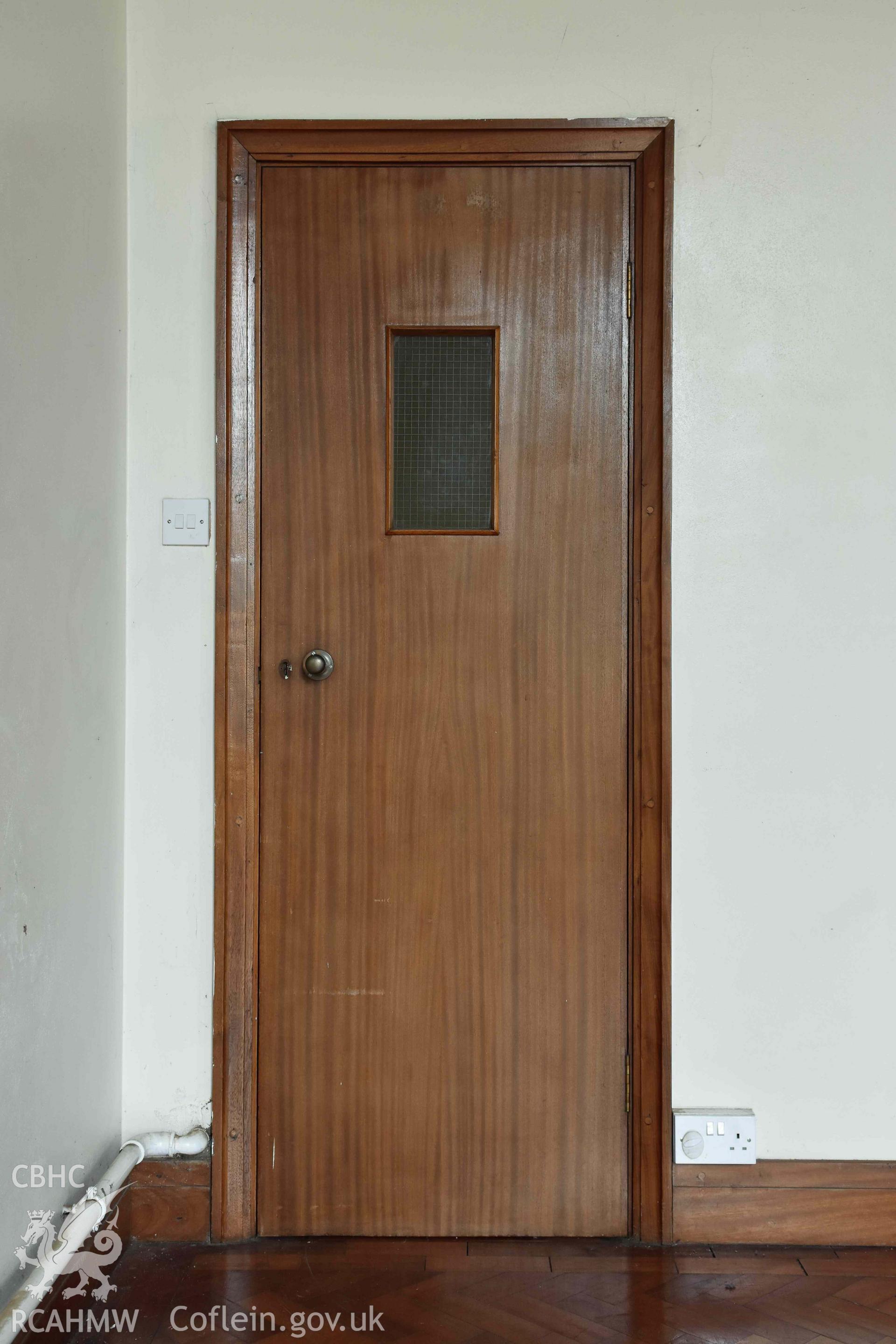 Fairwater Christ Church; interior of auditorium, detail of door in sanctuary Taken by Susan Fielding.