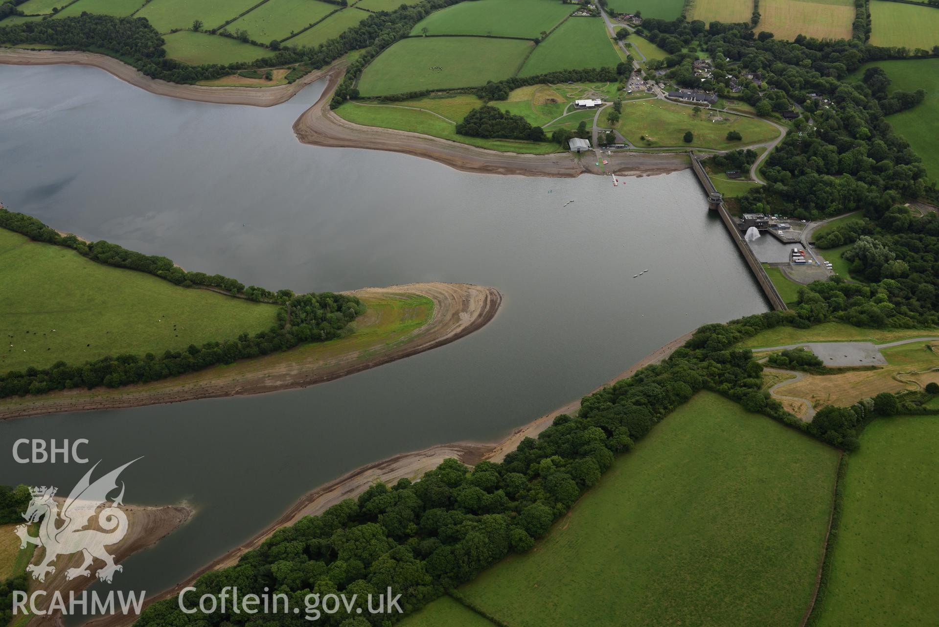 Detailed view of the dam at Llys y Fran Reservoir, Pembrokeshire, under drought conditions. Oblique aerial photograph taken during the Royal Commission’s programme of archaeological aerial reconnaissance by Toby Driver on 19 August 2022.