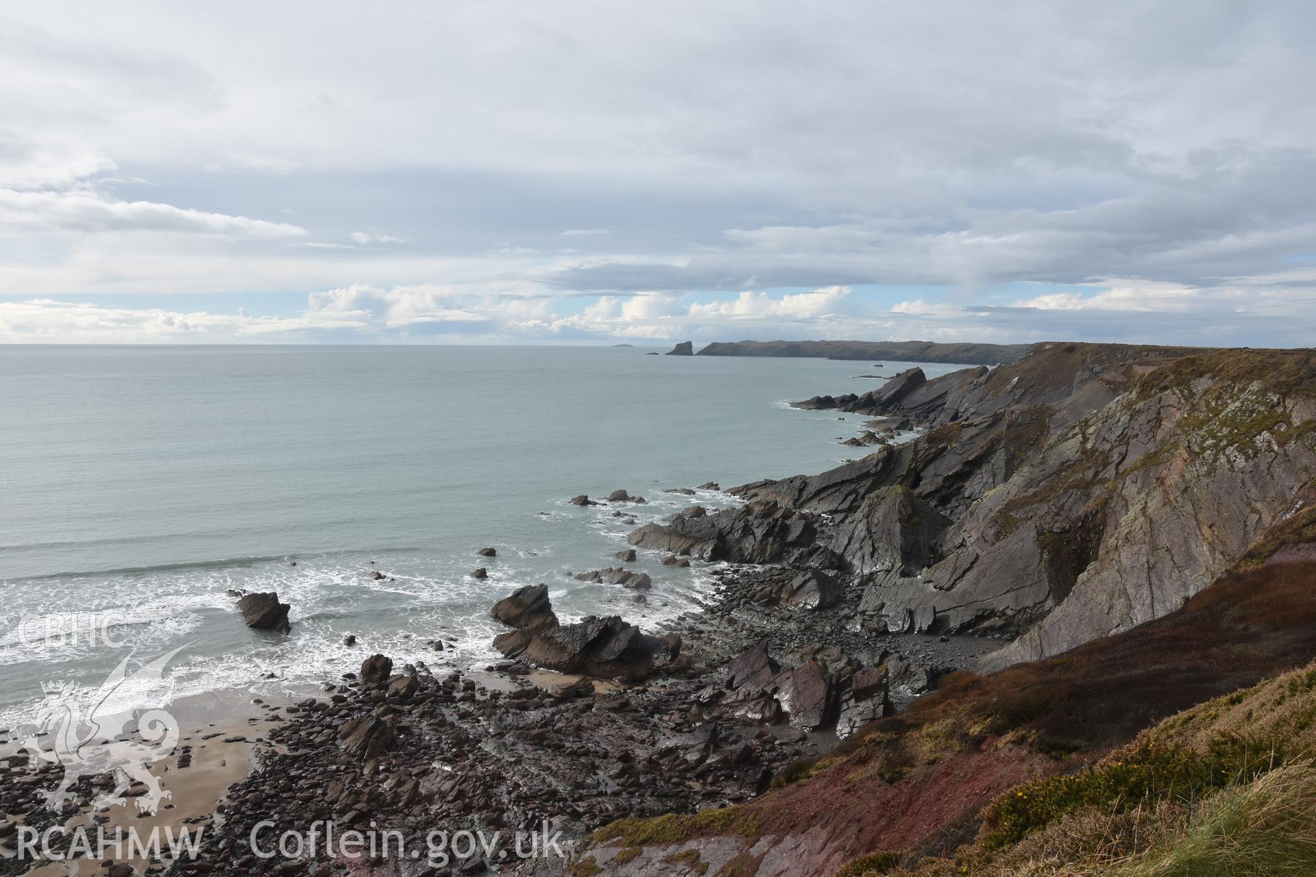 View SW along beach and coastline Taken by Daniel Hunt. Produced with EU funds through the Ireland Wales Co-operation Programme 2014-2023. All material made freely available through the Open Government Licence.