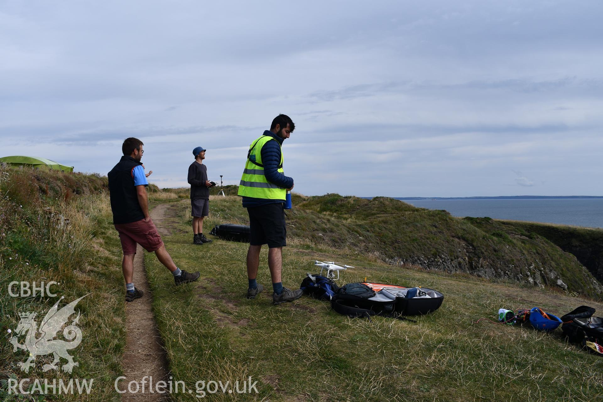 CHERISH team undertaking drone survey Taken by Daniel Hunt. Produced with EU funds through the Ireland Wales Co-operation Programme 2014-2023. All material made freely available through the Open Government Licence.
