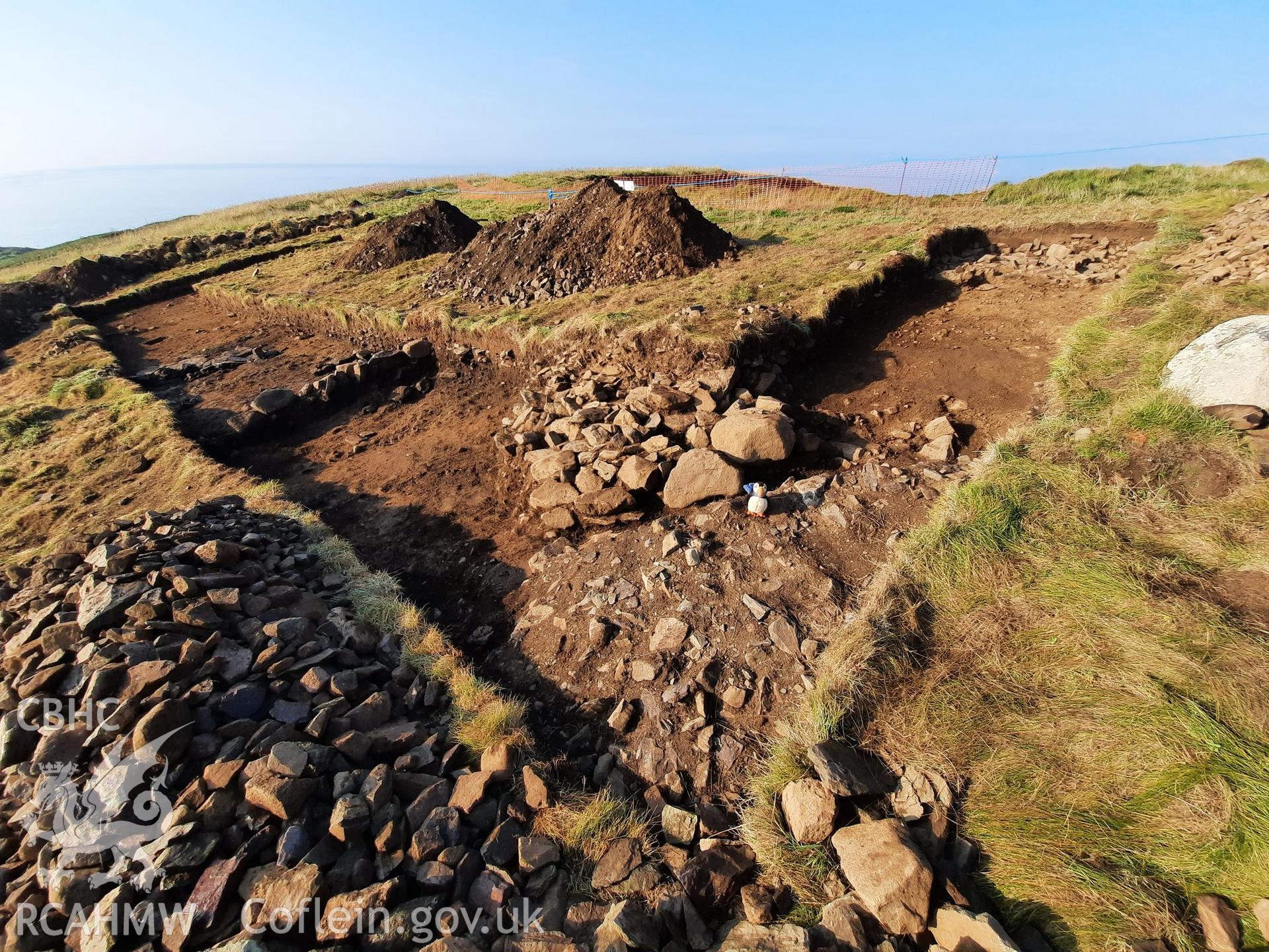 Excavations at Caerfai promontory fort Taken by Louise Barker. Produced with EU funds through the Ireland Wales Co-operation Programme 2014-2023. All material made freely available through the Open Government Licence.