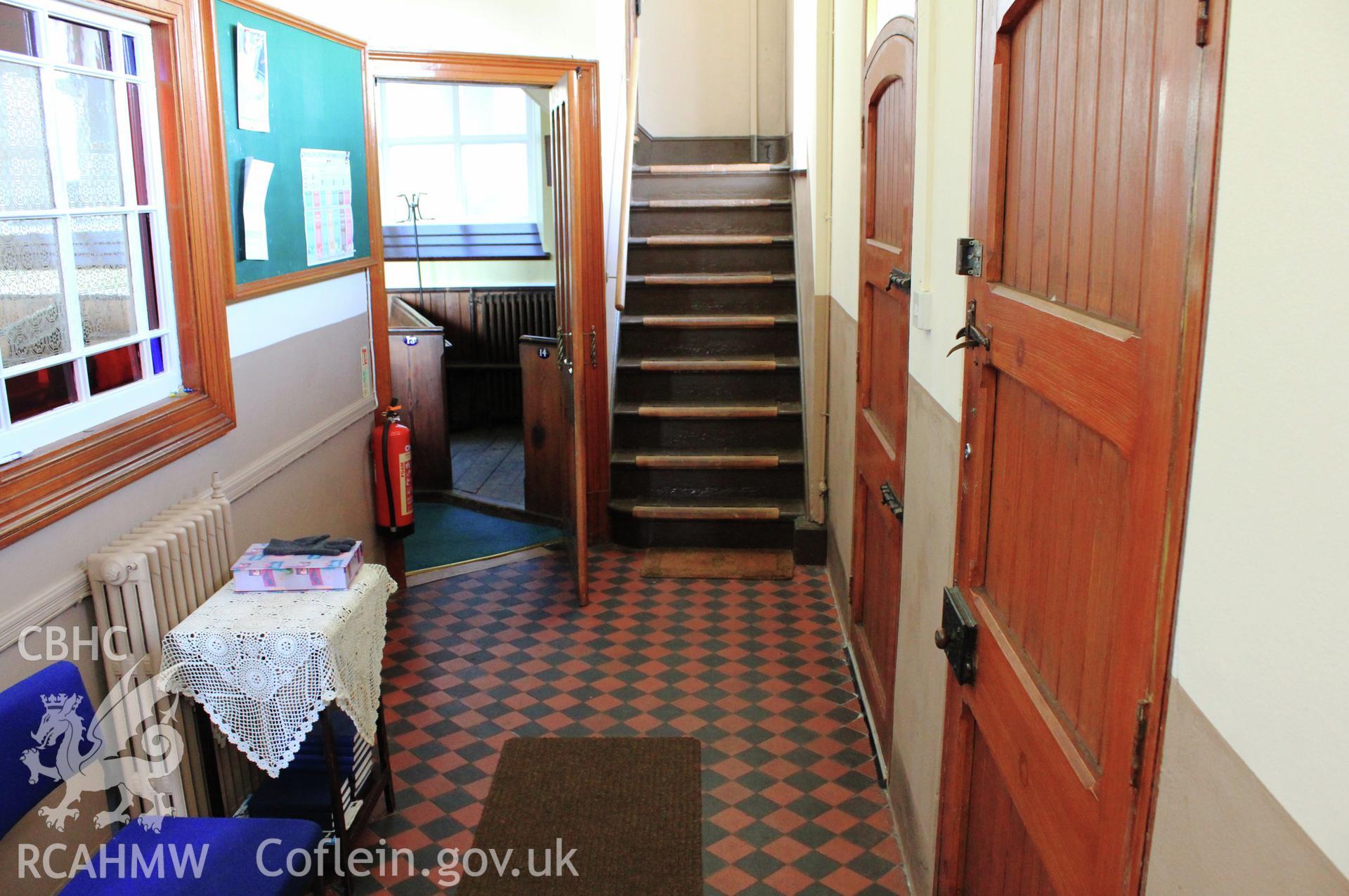 Main foyer. Doors and stairs.