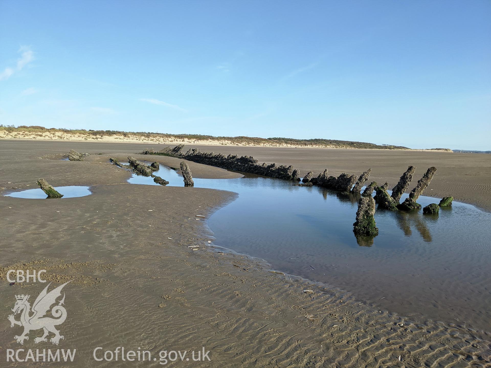 Unnamed wreck. Wide , towards dunes Taken by Meilyr Powel.