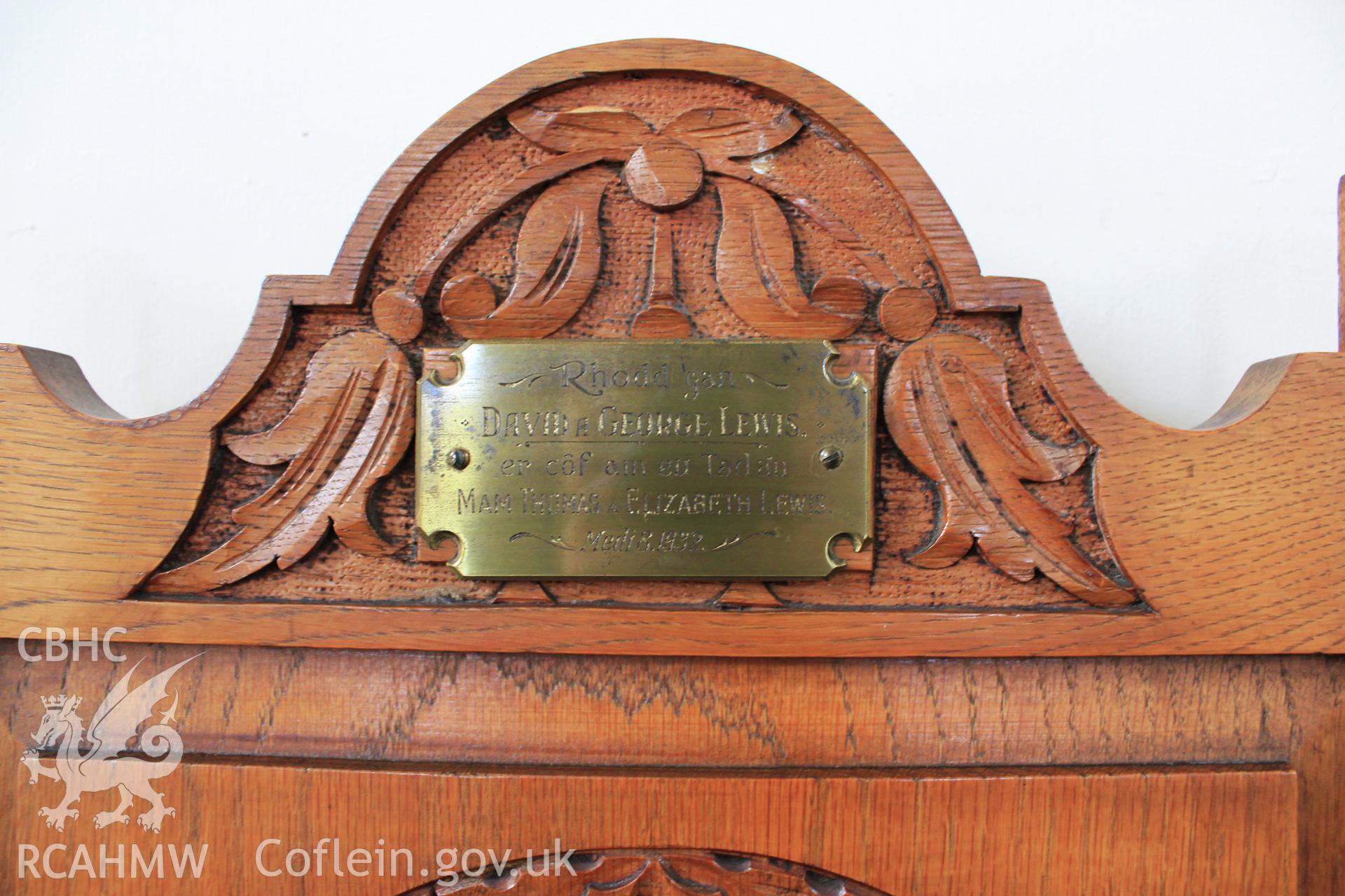 Chair plaque: 'Rhodd gan David a George Lewis er côf am eu Tad a'u MAM Thomas a ELIZABETH LEWIS Medi 8 1932. Gift by DAVID and GEORGE LEWIS in remembrance of their father and MOTHER THOMAS and ELIZABETH LEWIS. September 8 1932.