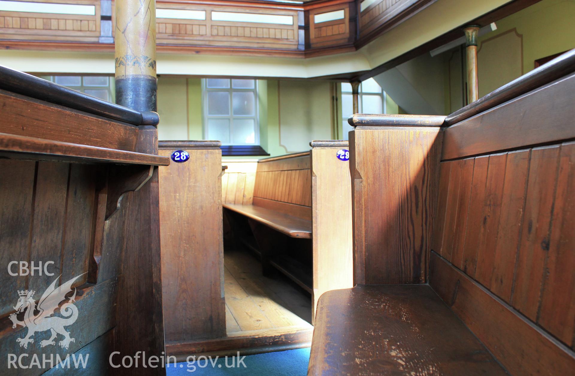 Benches 28 and 29. Low angle. Column on left.