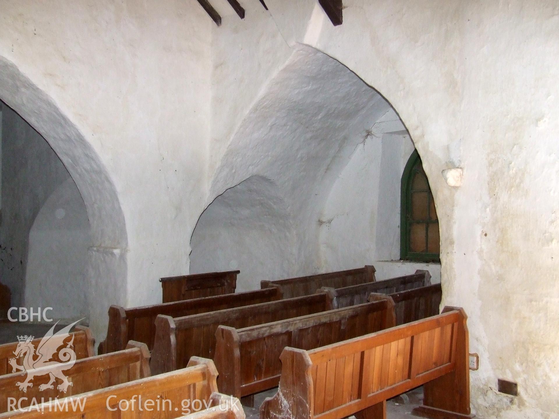 Digital colour photograph showing the transept and skew passage looking SE at St Justinian's Church, Llanstinian. Produced by Martin Davies in 2022.