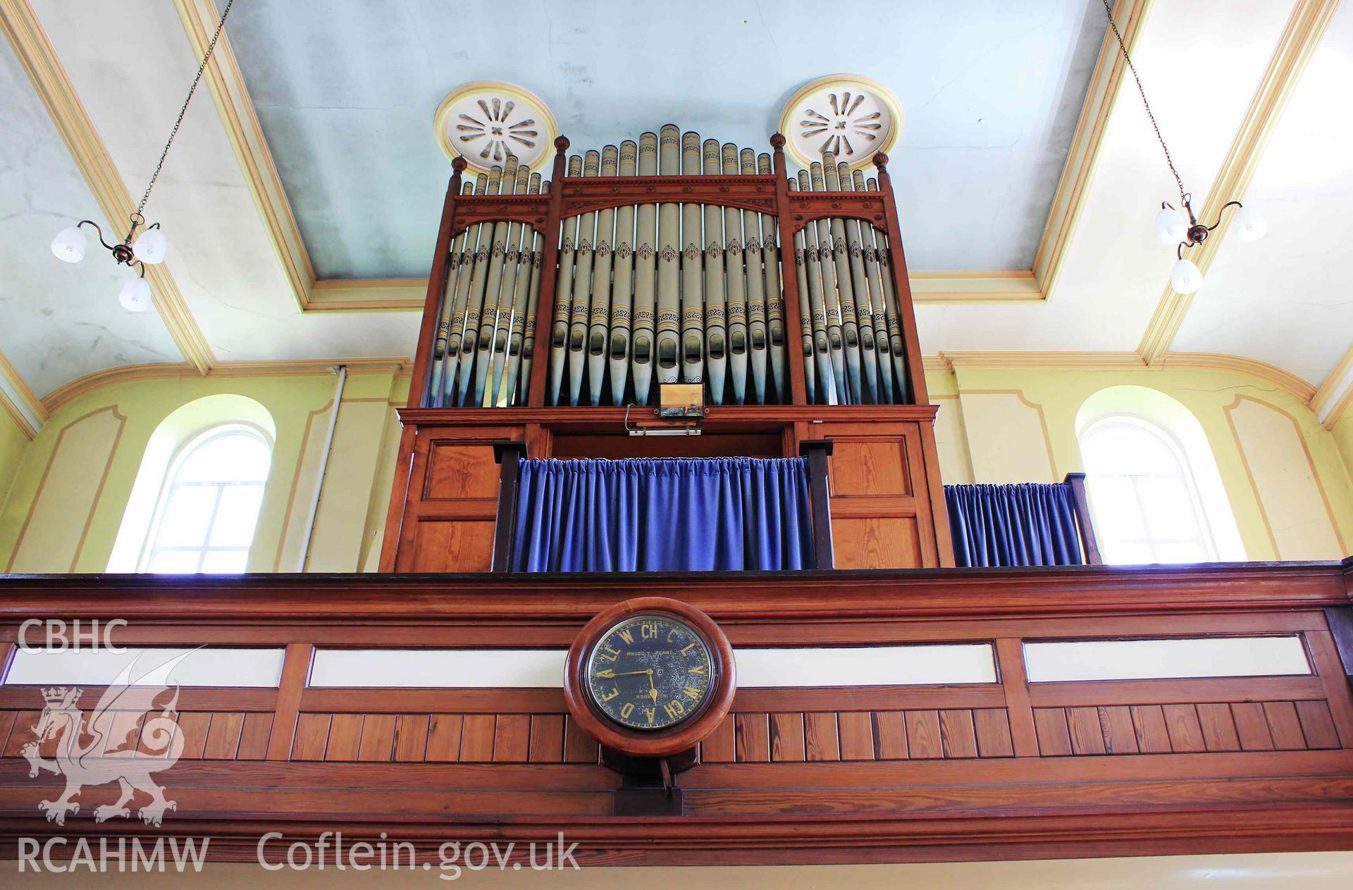 Organ and clock from below. Central.