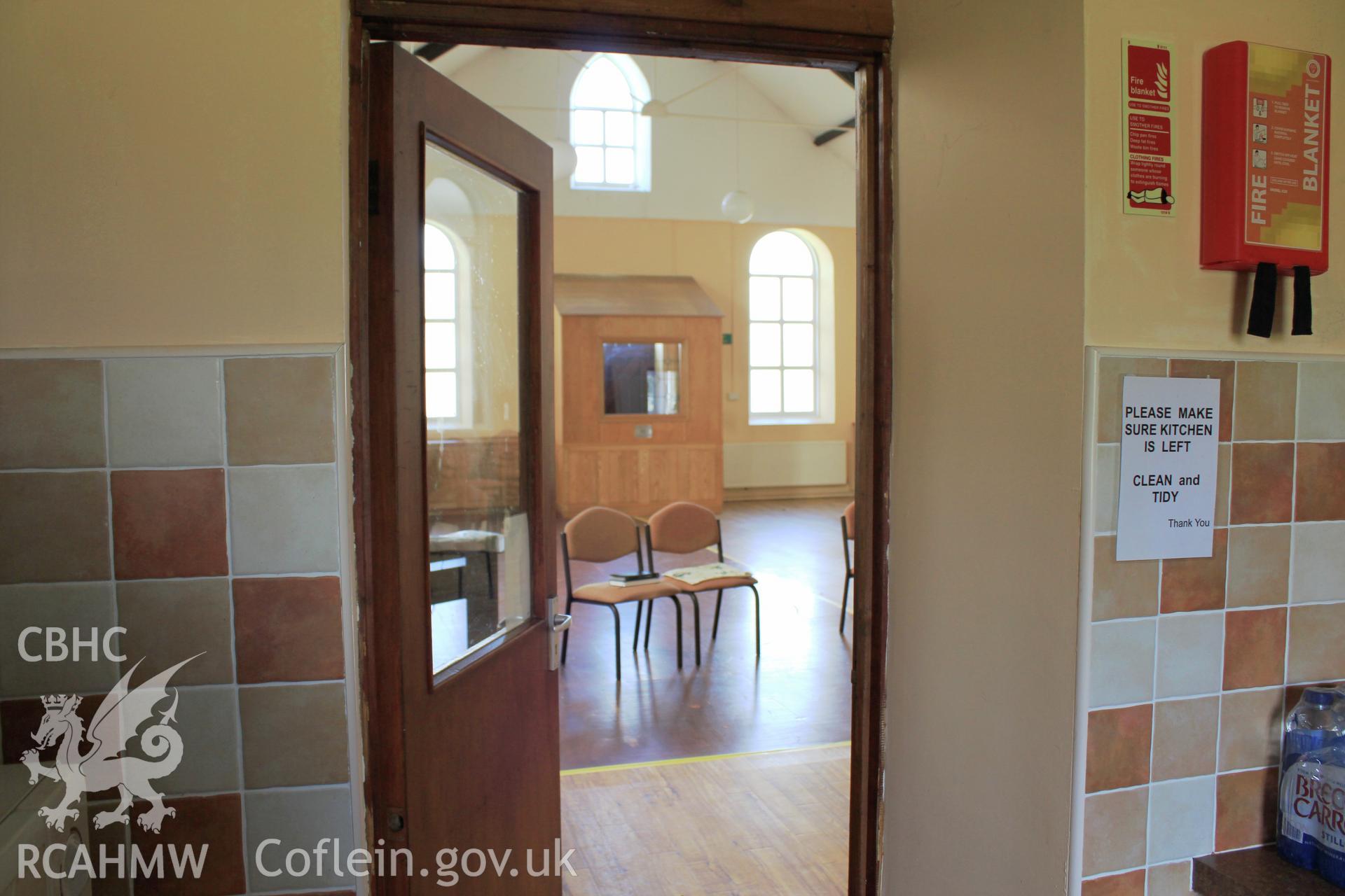 View from vestry kitchen towards east entrance porch.
