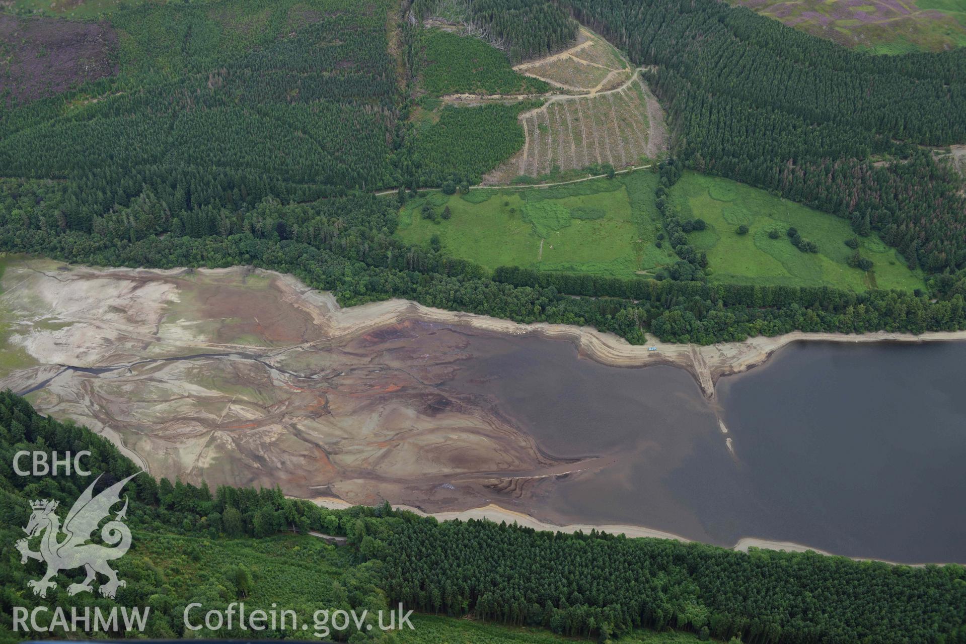 View of Lake Vyrnwy under drought conditions. Oblique aerial photograph taken during the Royal Commission’s programme of archaeological aerial reconnaissance by Toby Driver on 19 August 2022.