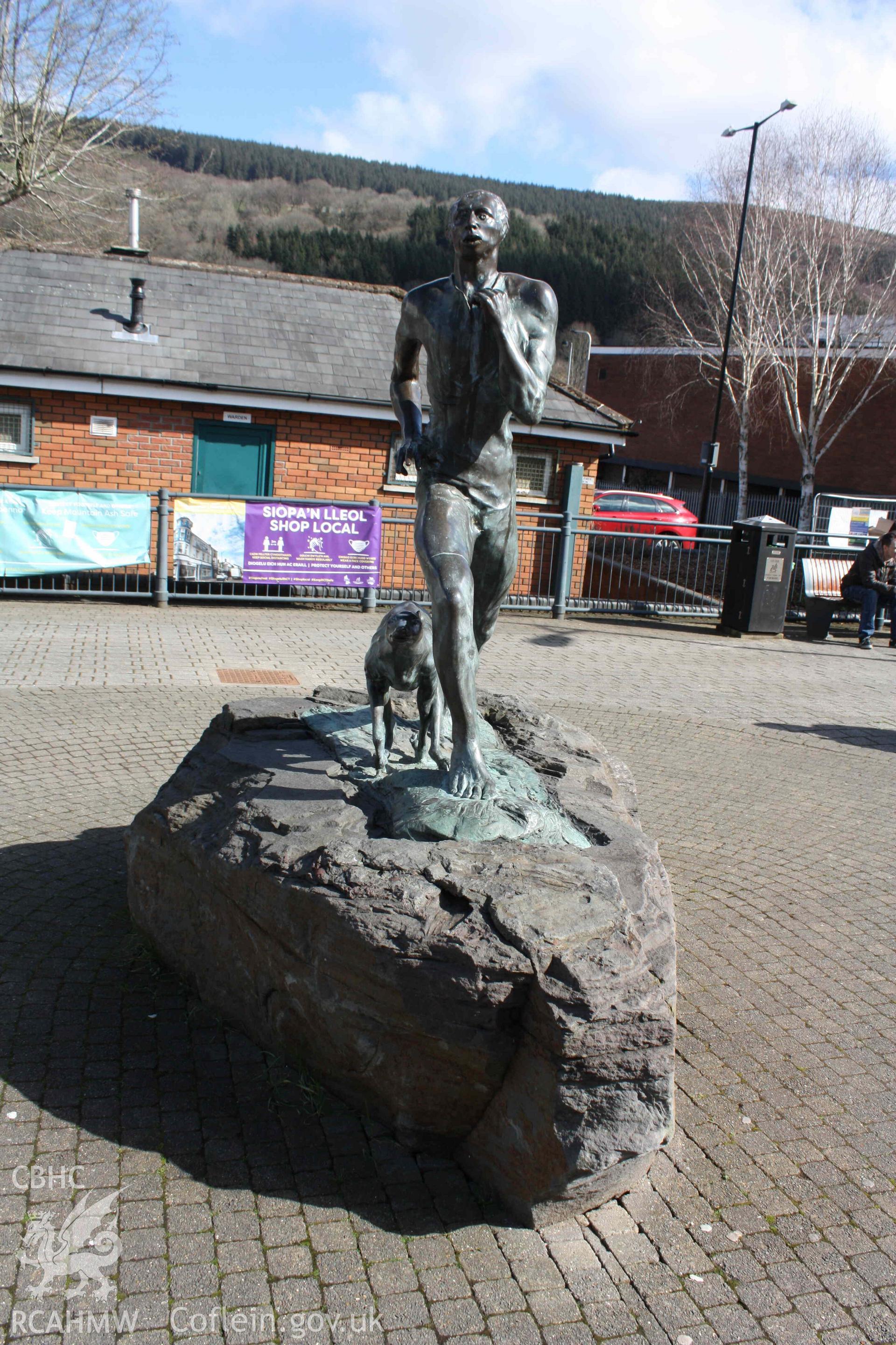 Digital colour photograph showing the statue of Guto Nyth Brân, Mountain Ash, taken 18 March, 2022.