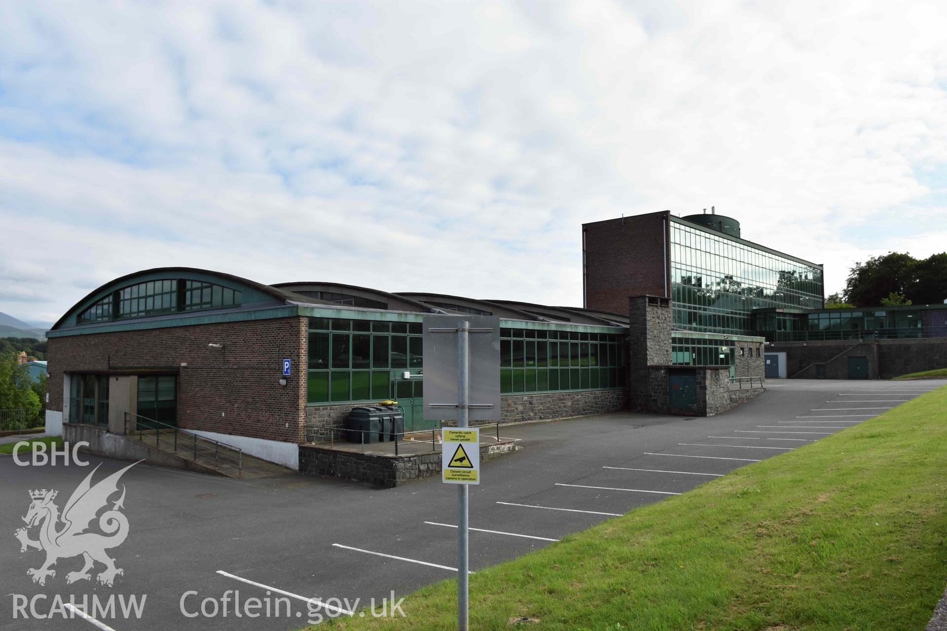 Digital colour photograph showing Caernarfonshire Technical College from the north-east, taken by Susan Fielding of RCAHMW 7 May 2019.