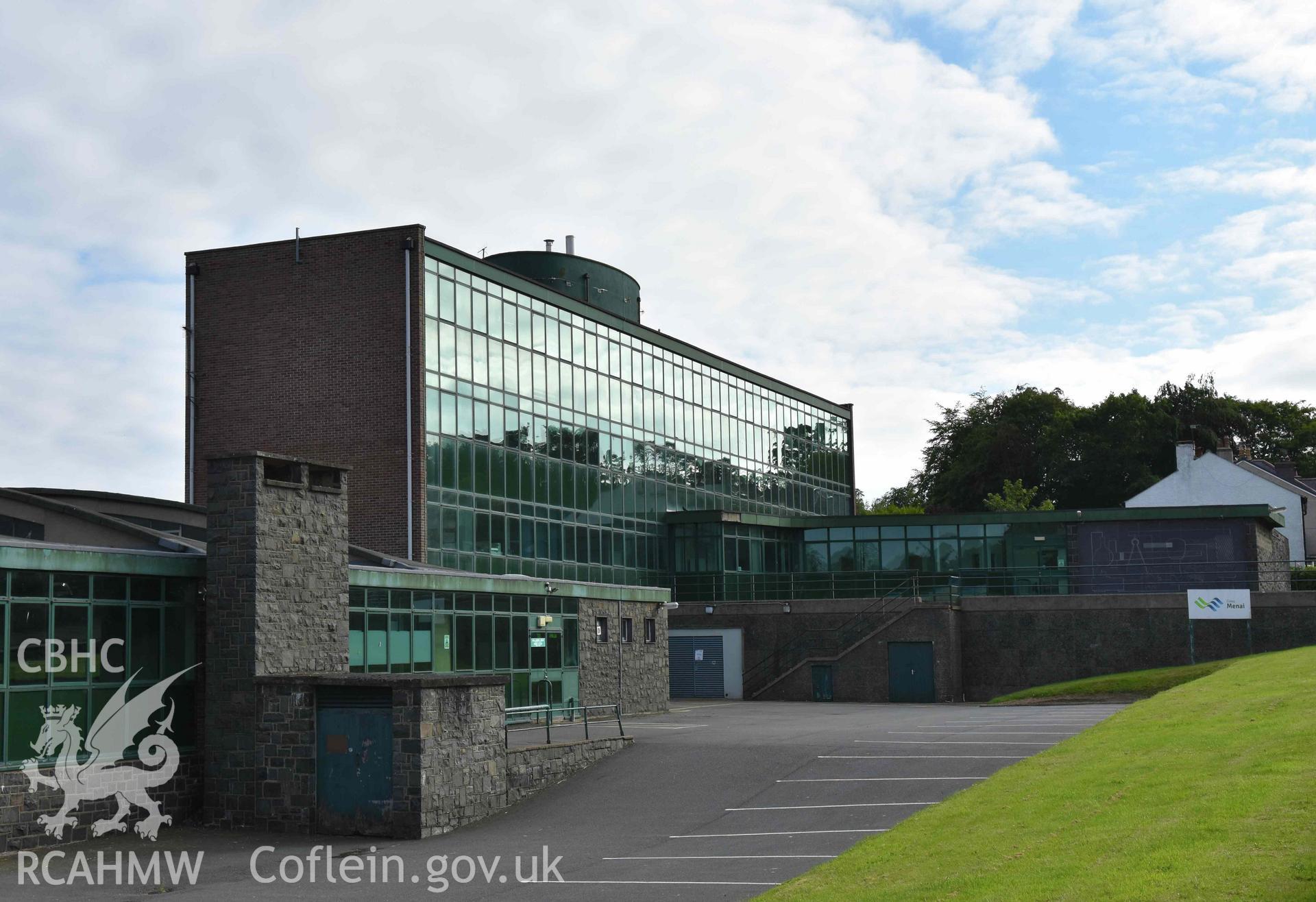 Digital colour photograph showing Caernarfonshire Technical College from the north-east, taken by Susan Fielding of RCAHMW 7 May 2019.