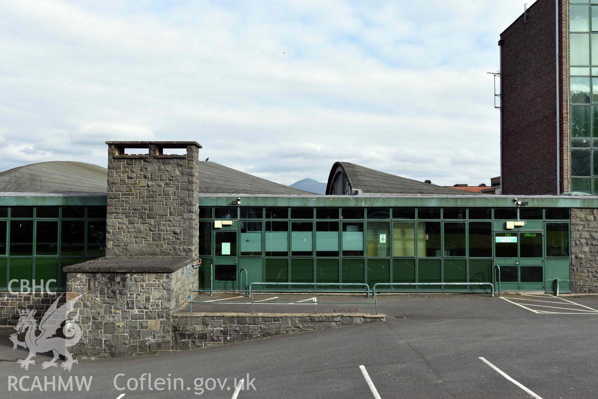 Digital colour photograph showing Caernarfonshire Technical College; the workshops from the north, taken by Susan Fielding of RCAHMW 7 May 2019.
