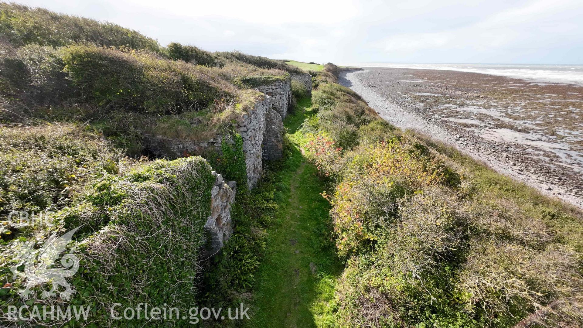 Digital colour photograph showing Craiglas Lime Kilns - General view along the north-west (seaward) side of the lime kiln complex, looking north-east. Lime kiln No.4 is in the foreground.