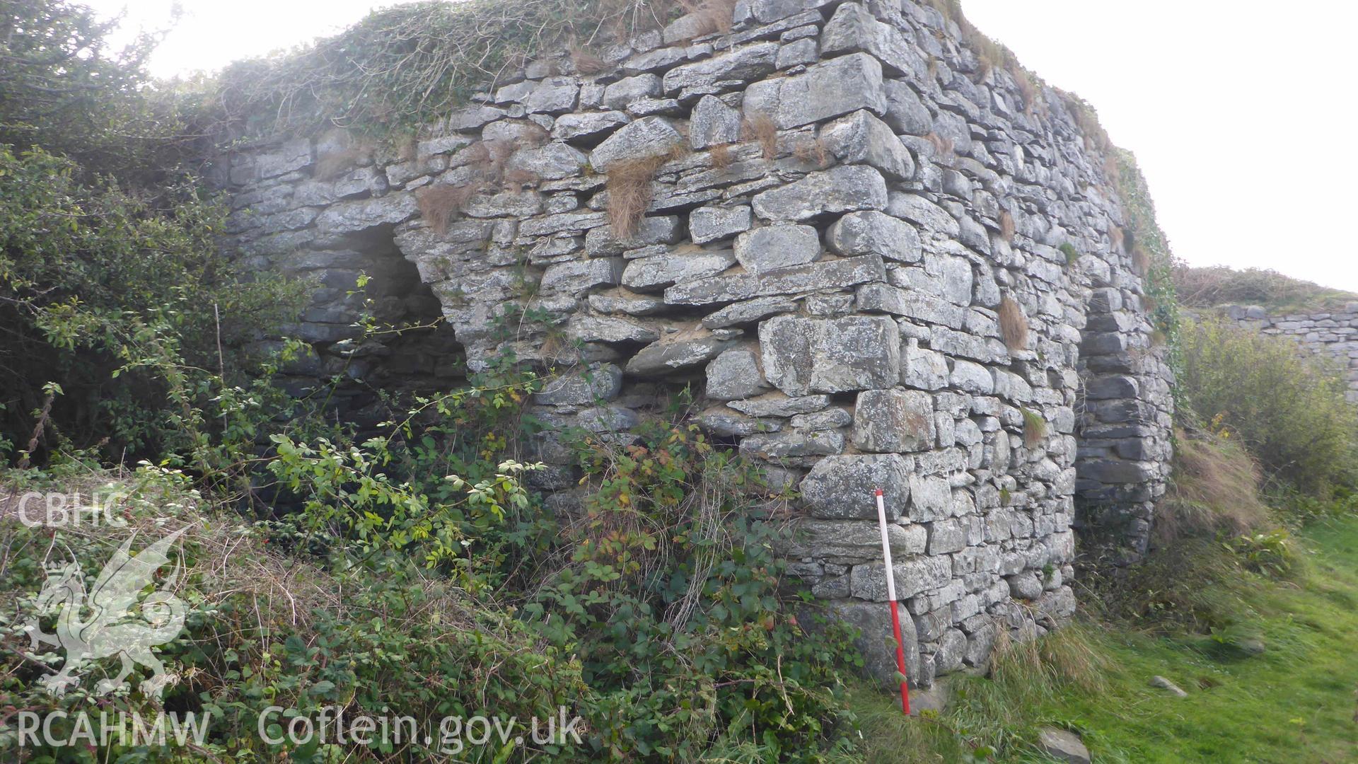 Digital colour photograph showing Craiglas Lime Kilns - lime Kiln 2, north-west (right) and north-east elevations and kiln-eyes.