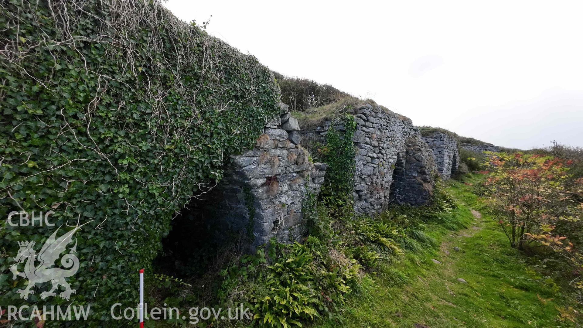Digital colour photograph showing Craiglas Lime Kilns - general view along the north-west (seaward) side of the lime kiln complex, looking south-west. Lime kiln No.4 is in the foreground.