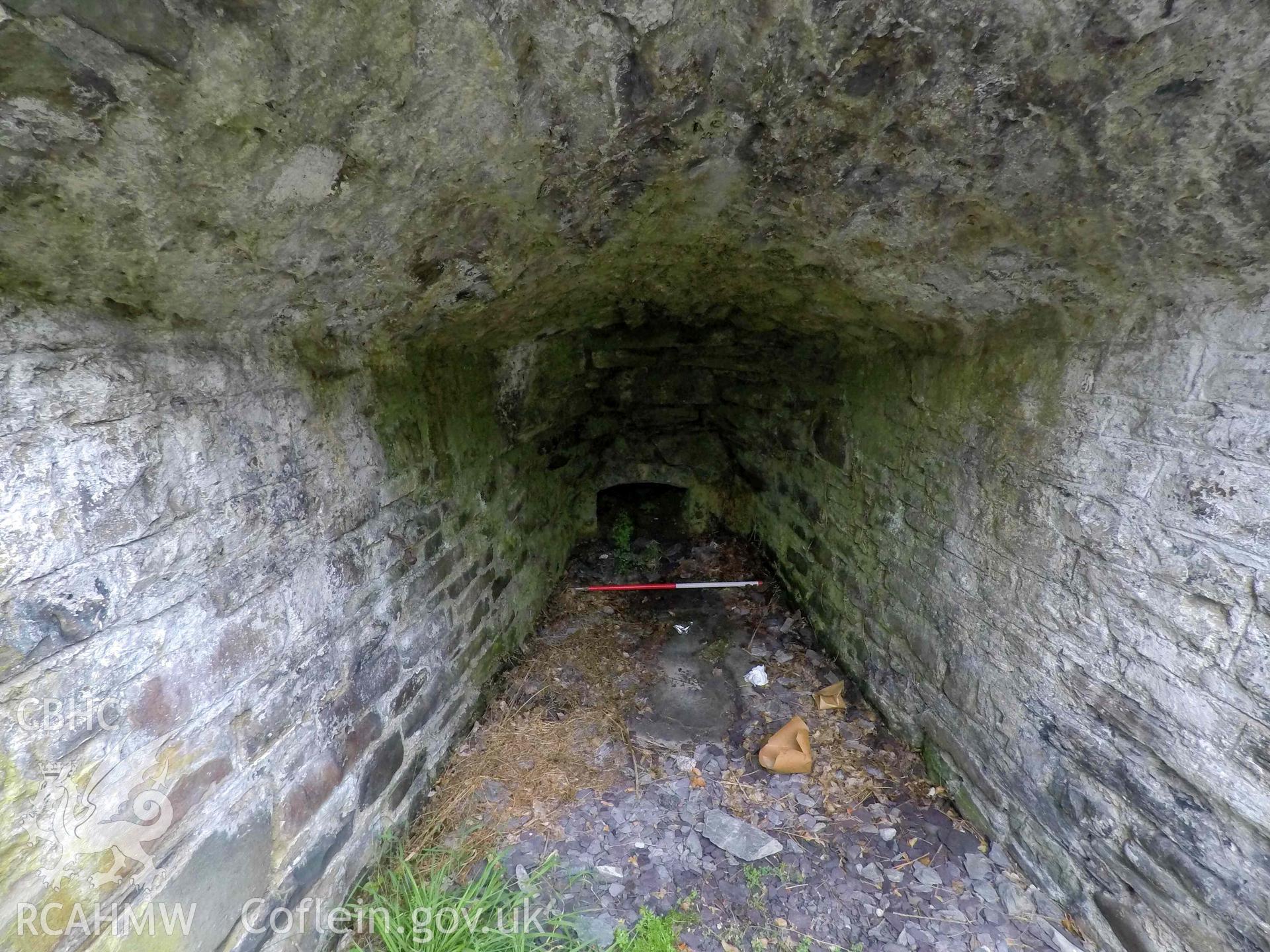 Llangrannog Limekiln. Detail of fireplace/draw-hole in southwest kiln eye with scale. Taken 24 August 2022