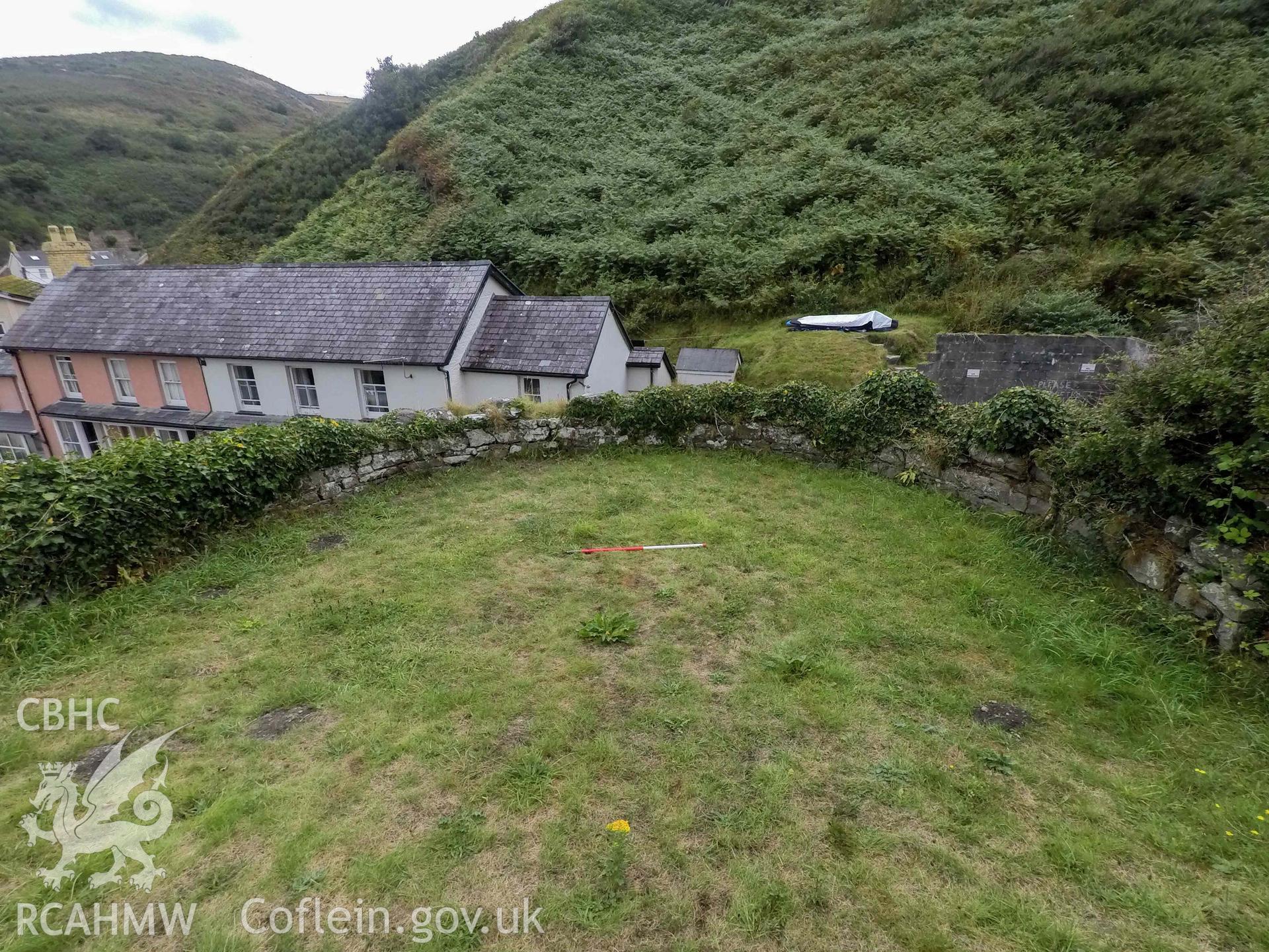 Llangrannog Limekiln. Infilled crucible and parapet wall looking east with scale. Taken 24 August 2022