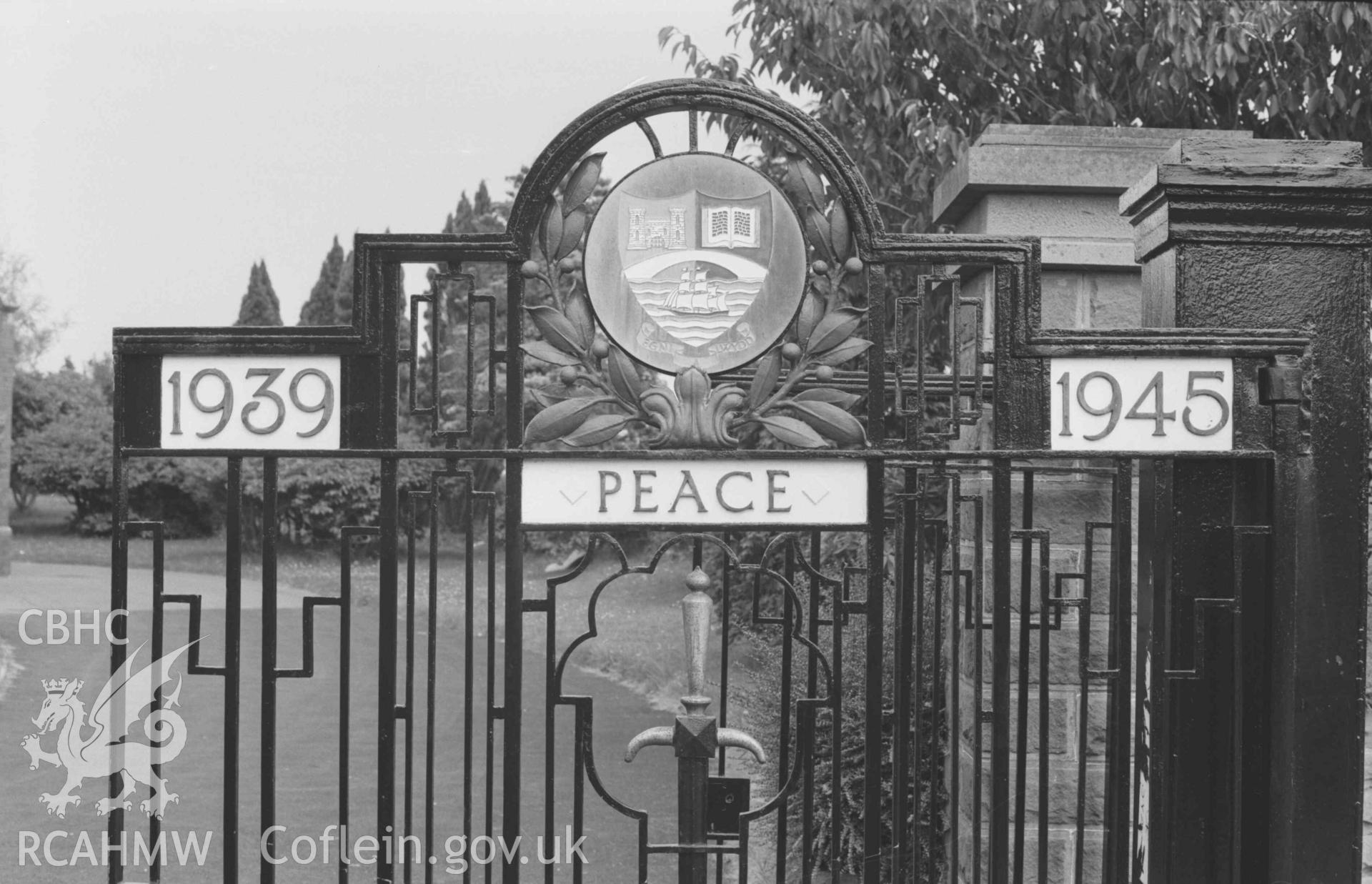 Digital copy of a black and white negative showing War Memorial gates (Second World War) on County School by Victoria Gardens, Cardigan. Photographed by Arthur Chater on 30 August 1968. Looking north east from Grid Reference SN 1818 4653.
