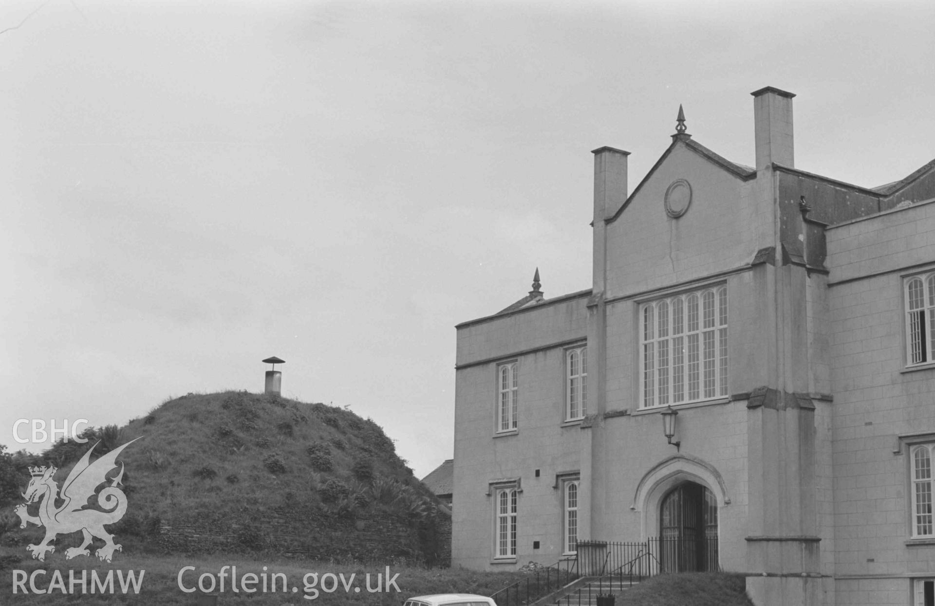 Digital copy of a black and white negative showing rear entrance to quadrangle at Lampeter College, with Norman motte on left. Photographed by Arthur Chater on 21 August 1968. Looking south east from Grid Reference SN 579 483.