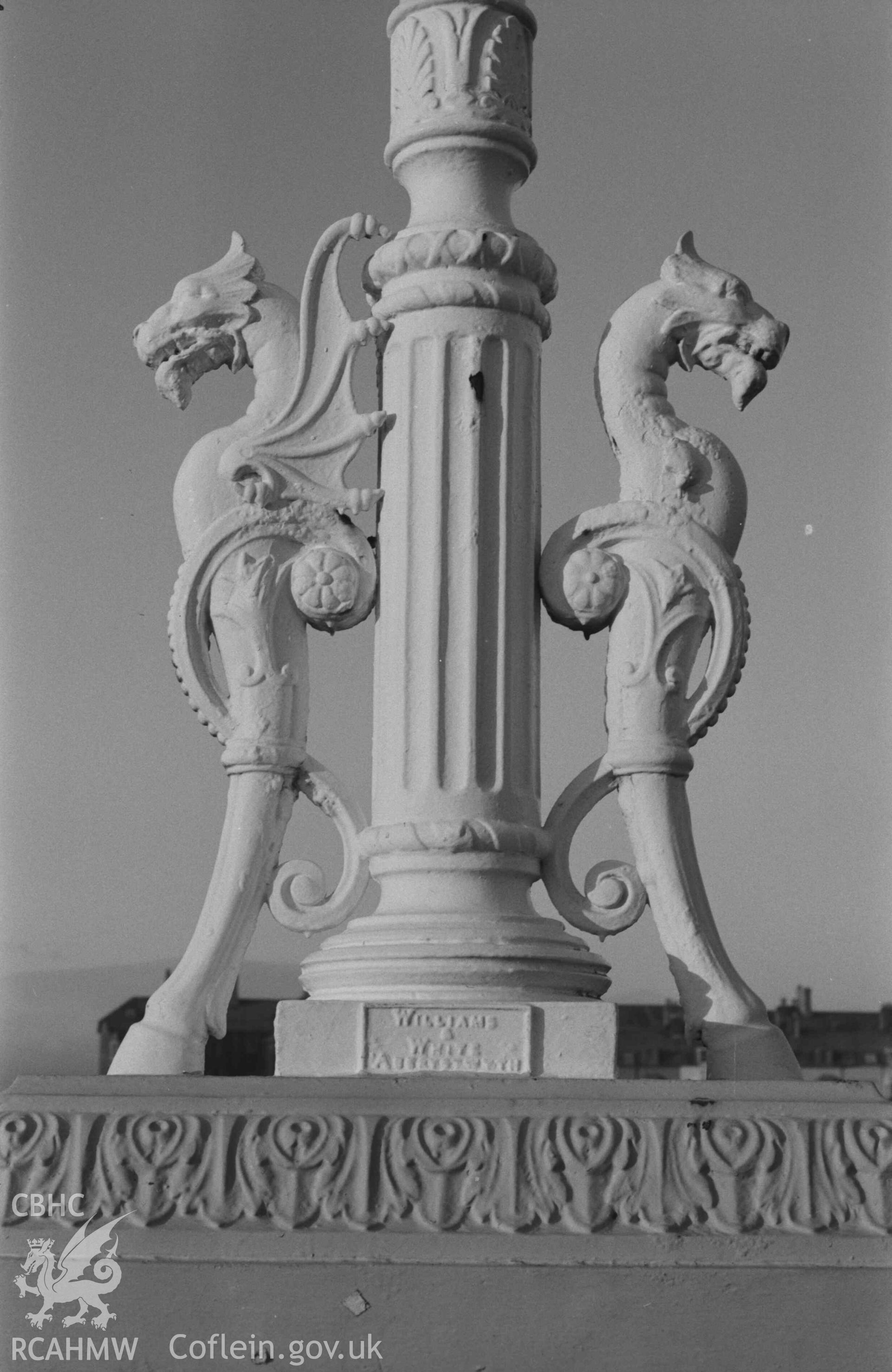 Digital copy of a black and white negative showing cast iron lamp standard on Trefechan Bridge marked 'WILLIAMS & WHITE ABERYSTWYTH'. Photographed by Arthur Chater on 27 December 1968. Looking west from Grid Reference SN 5827 8133.