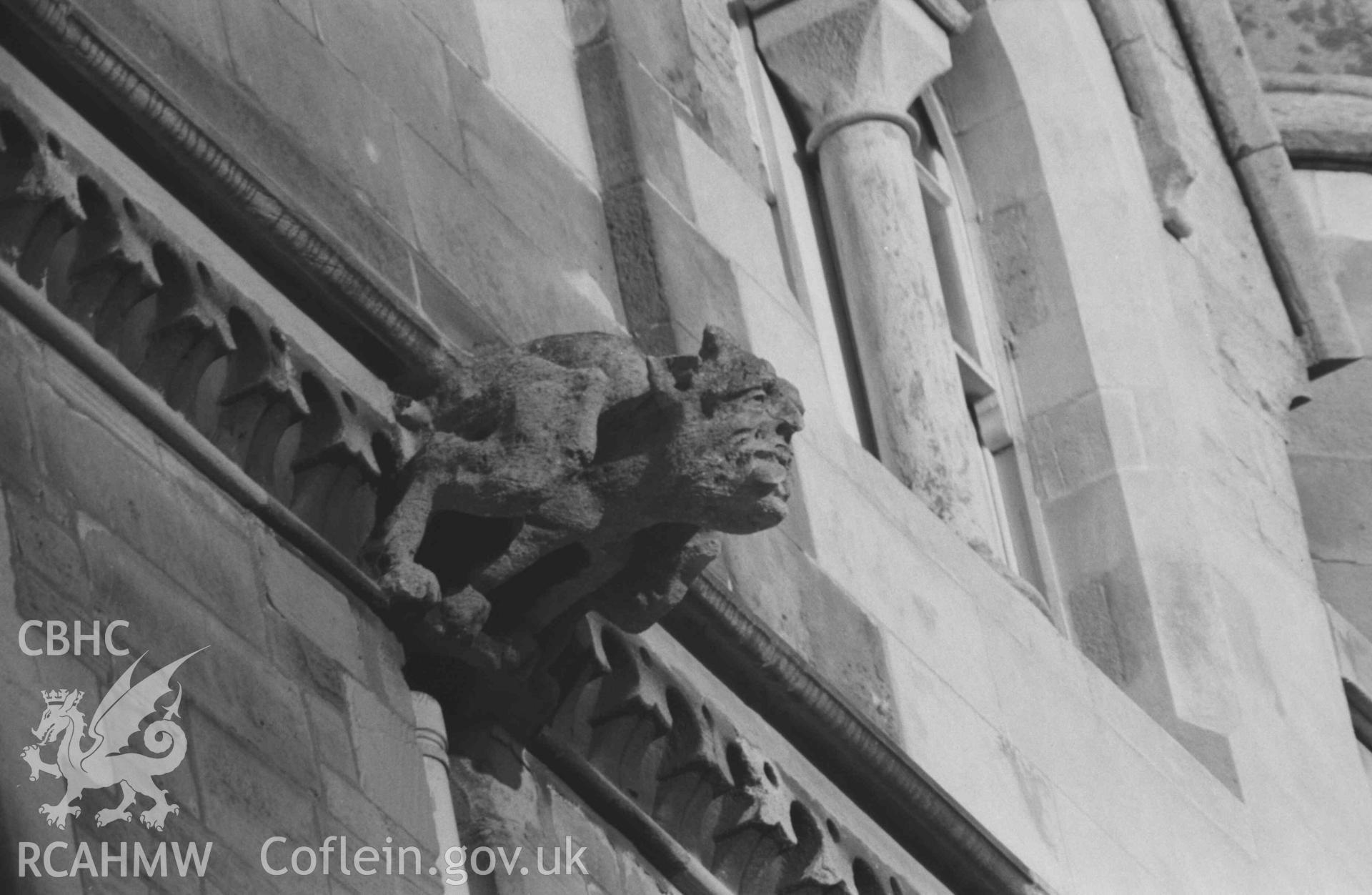 Digital copy of a black and white negative showing gargoyles on the south east side of the University College Wales building overlooking King Street (telephoto). Photographed by Arthur Chater on 27 December 1968. Looking north east from Grid Reference SN 5808 8169.