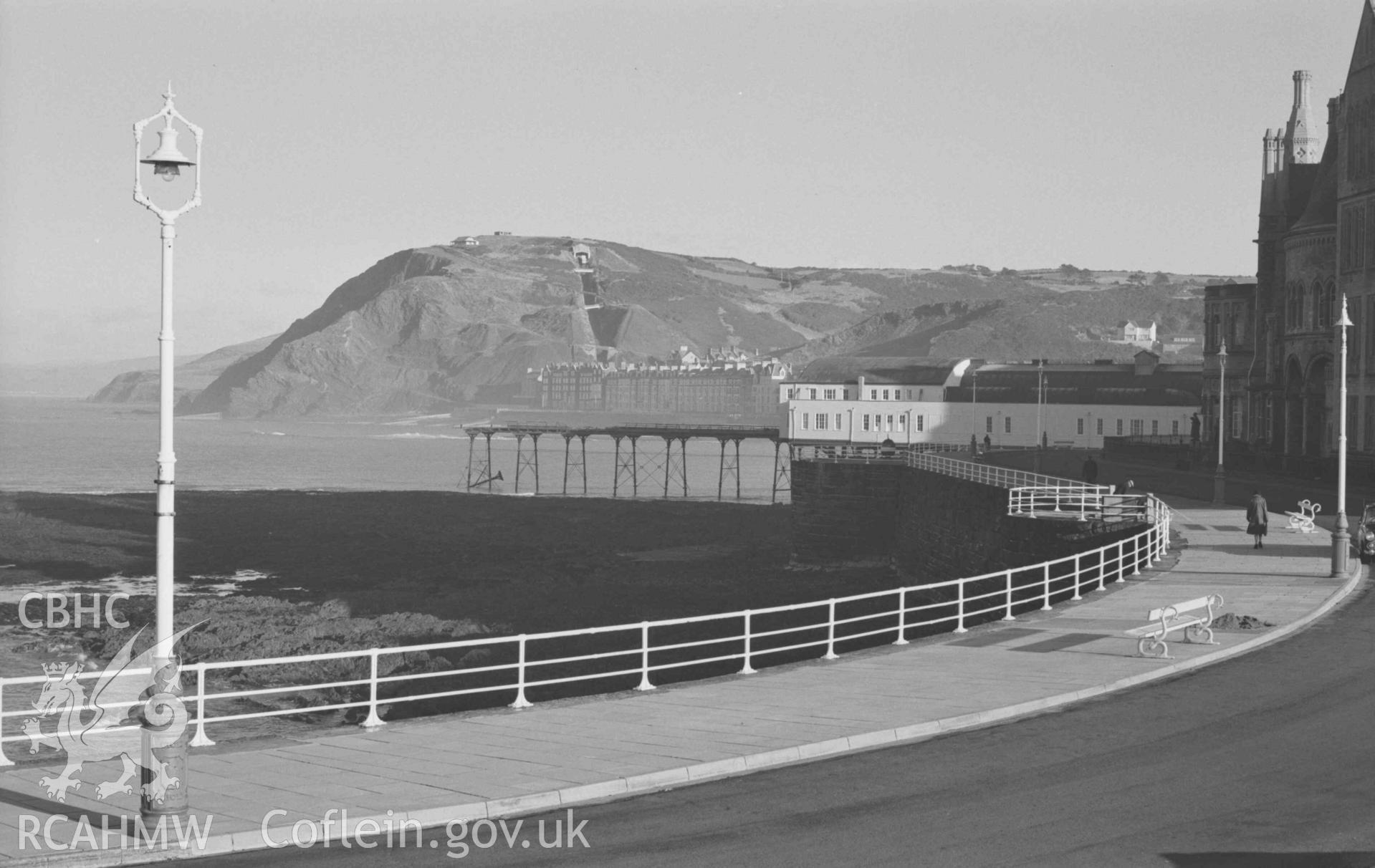 Digital copy of a black and white negative showing view along the New Promenade from the end of King Street. Photographed by Arthur Chater on 27 December 1968. Looking north east from Grid Reference SN 5795 8161.