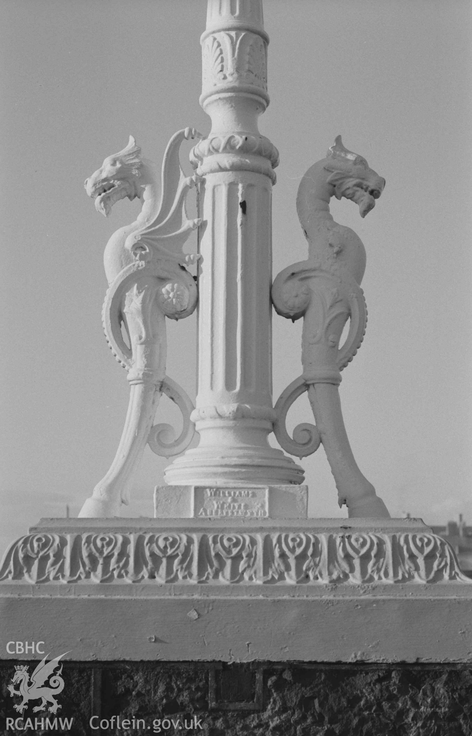 Digital copy of a black and white negative showing cast iron lamp standard on Trefechan Bridge, marked 'WILLIAMS & WHITE ABERYSTWYTH'. Photographed by Arthur Chater on 27 December 1968. Looking west from Grid Reference SN 5827 8133.
