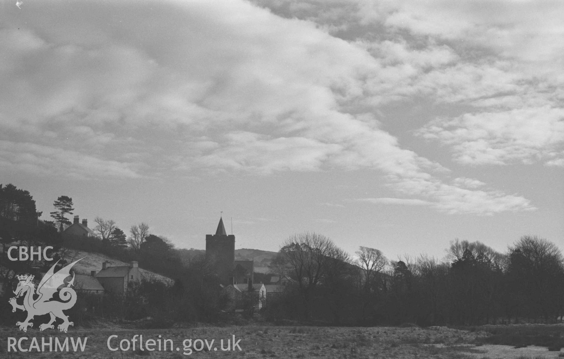 Digital copy of a black and white negative showing the church from the lane to the gasworks, Llanbadarn Fawr. Photographed by Arthur Chater on 28 December 1968. Looking east from Grid Reference SN 5952 8110.
