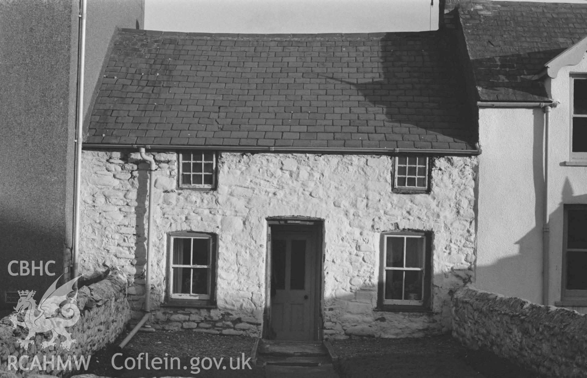 Digital copy of a black and white negative showing cottage two doors north of Gorwel Cottage, High street, Borth. Photographed by Arthur Chater on 2 January 1969. Looking east from Grid Reference SN 6084 8964.