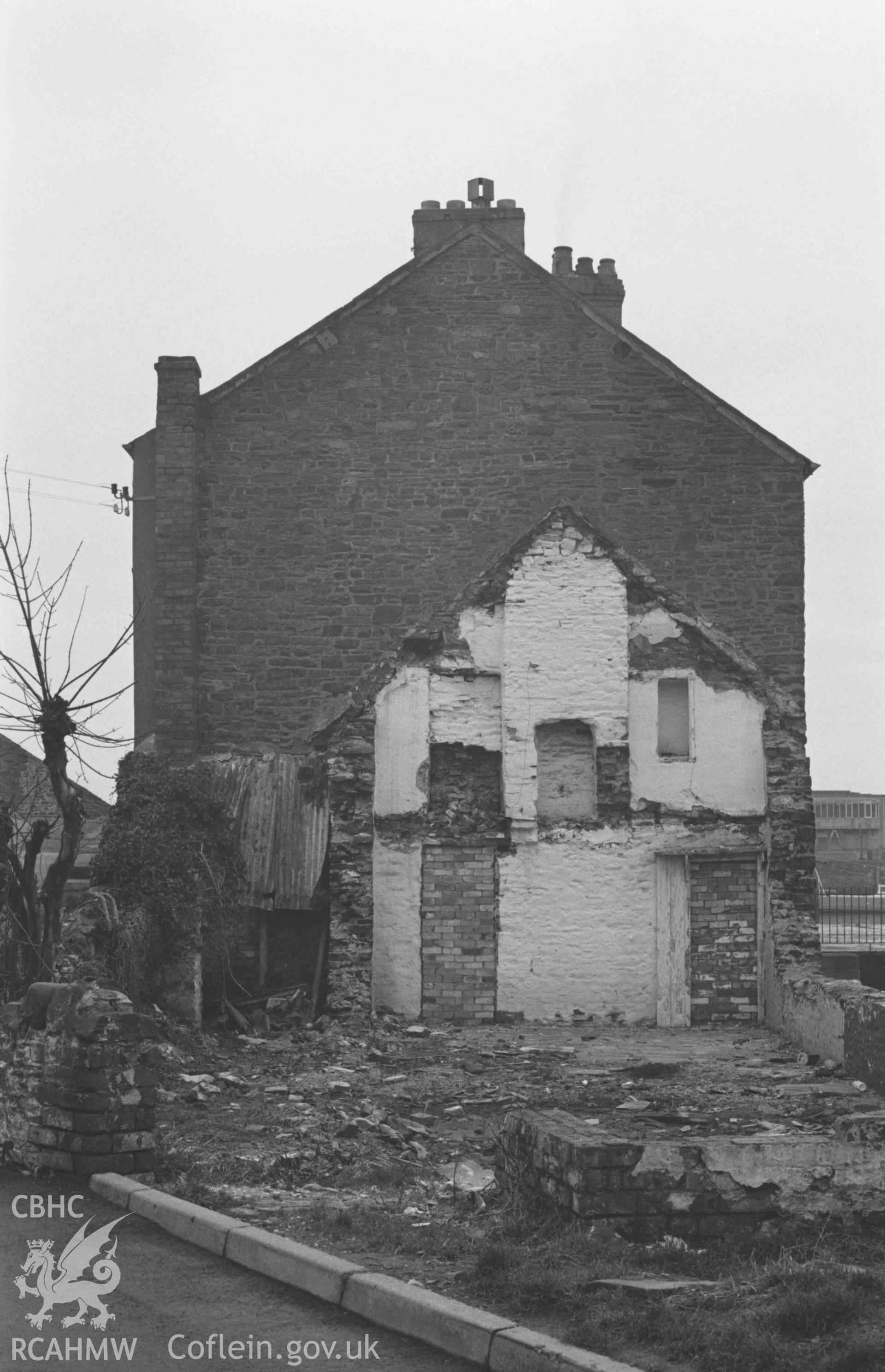 Digital copy of a black and white negative showing end of house. Photographed by Arthur Chater on 3 January 1969.