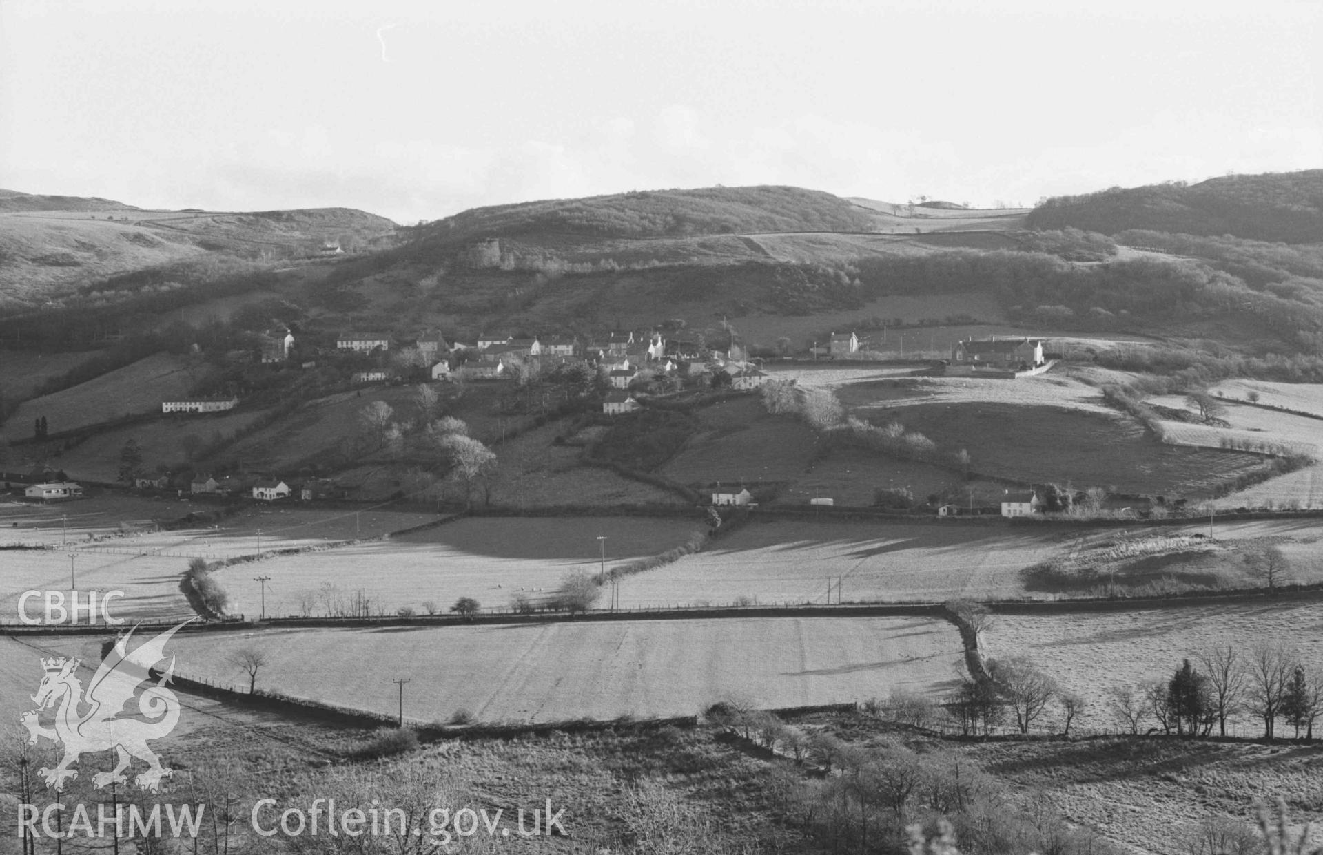 Digital copy of a black and white negative showing view from the lane above Troed-y-Rhiw, across the Melindwr valley to Goginan. Photographed by Arthur Chater on 5 January 1969. Looking south south east from Grid Reference SN 6840 8177.