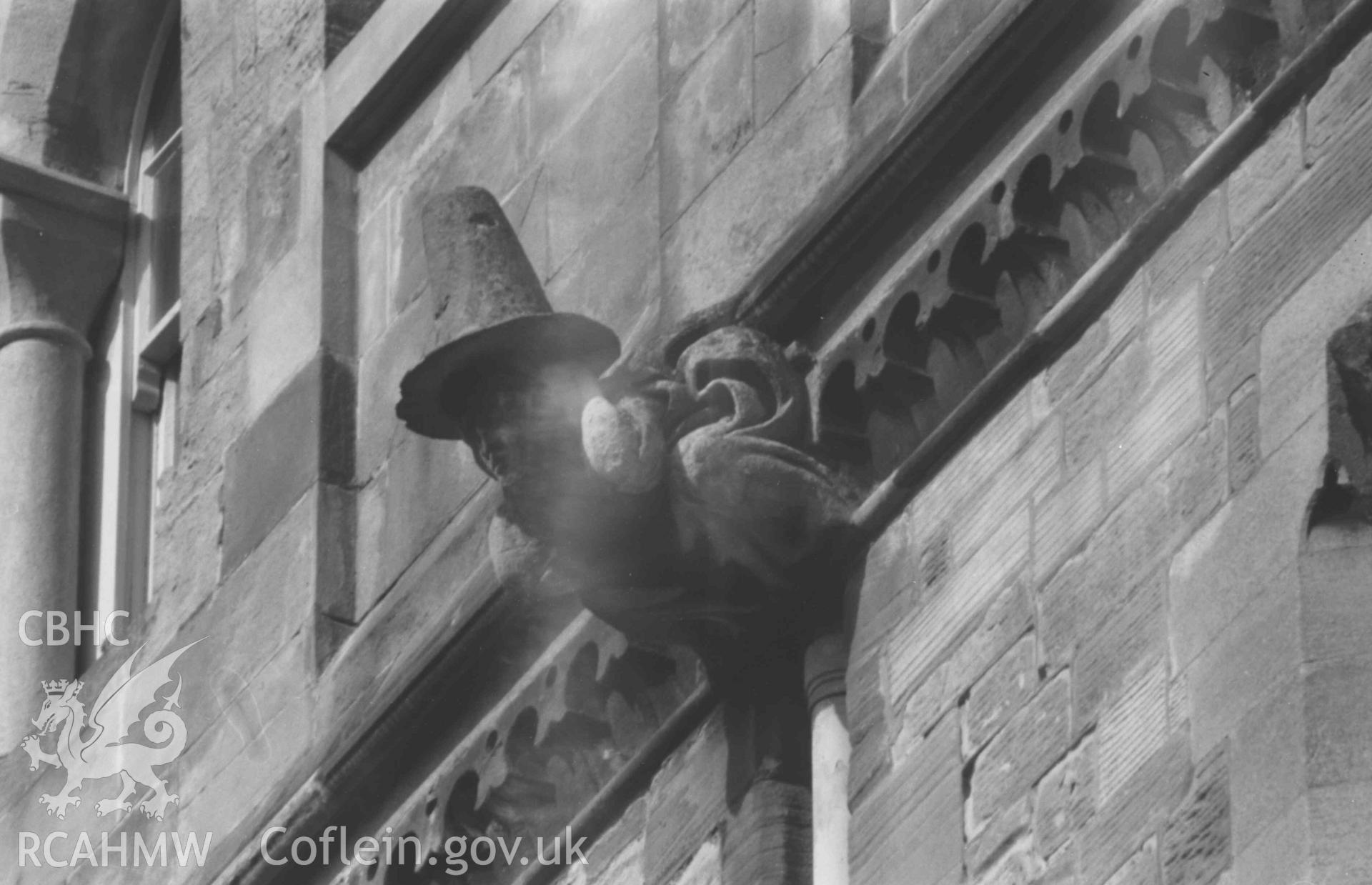 Digital copy of a black and white negative showing gargoyles on the south east side of the UCW building overlooking King Street, Aberystwyth (Telephoto). Photographed by Arthur Chater on 2 April 1969. Grid Reference SN 581 817.