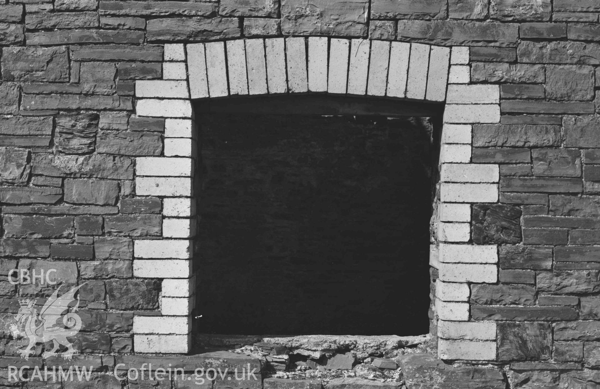 Digital copy of a black and white negative showing window in front wall of ruin of main building of Llywernog lead mine, lined with yellow Ruabon bricks. Photographed by Arthur Chater on 2 April 1969. Looking north from Grid Reference SN 7325 8093.