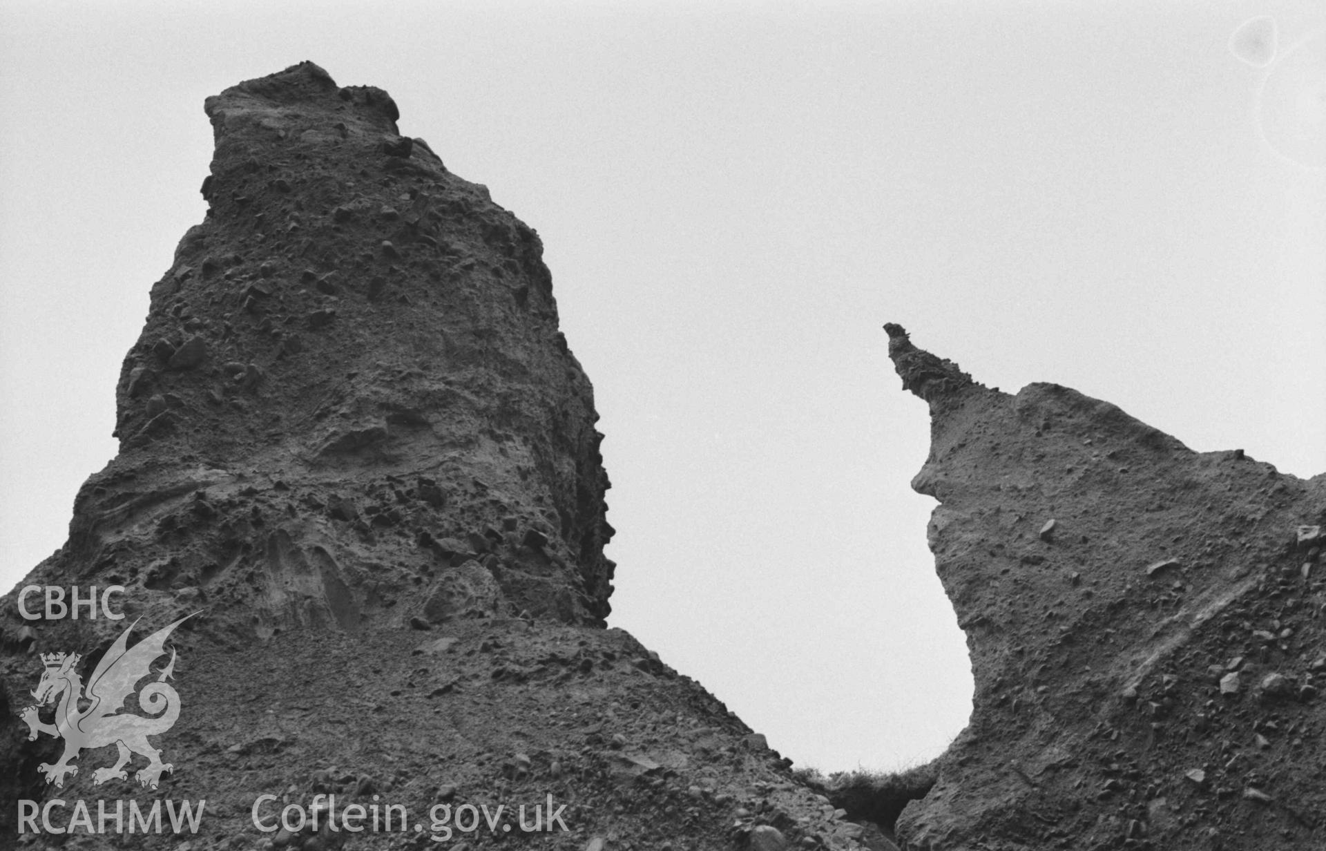 Digital copy of a black and white negative showing eroded boulder clay cliffs 100m north east of the mouth of the Afon Cwinten. Photographed by Arthur Chater on 3 January 1969. Looking south east from Grid Reference SN 436 614.