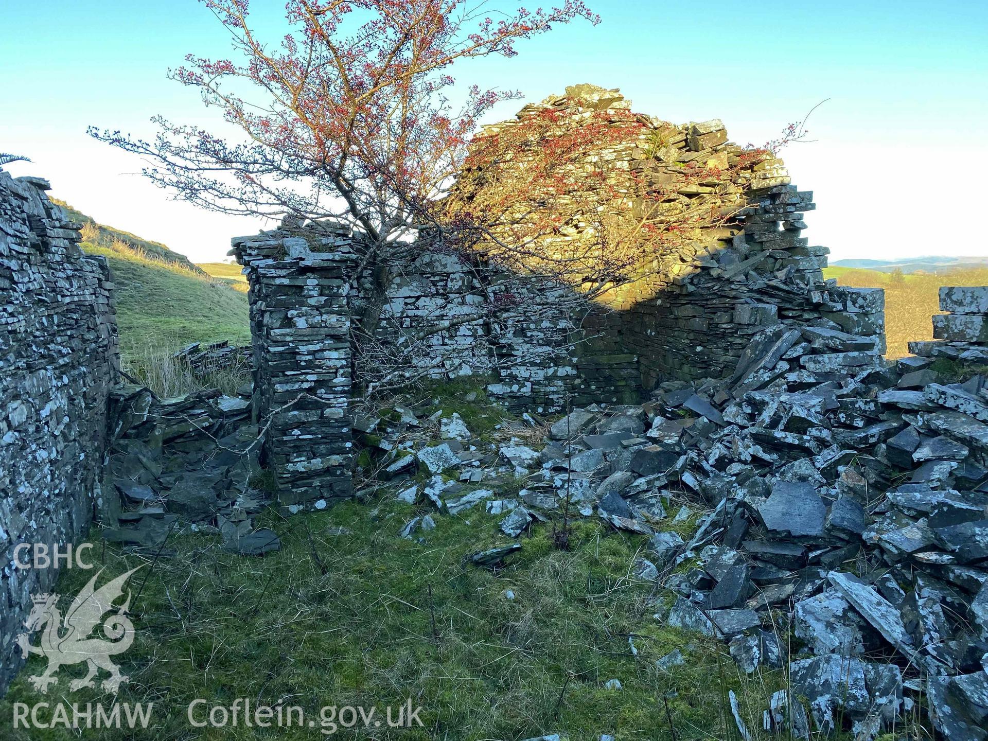 Digital colour photograph showing Blaen Wyre-isaf (view of main fireplace).