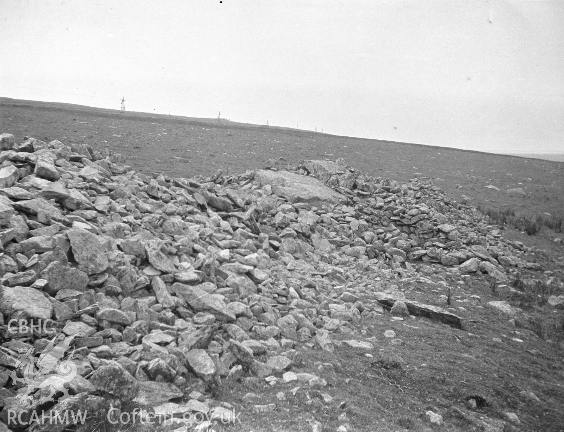 Digital copy of a nitrate negative showing Carneddau Hengwm Long Cairns.