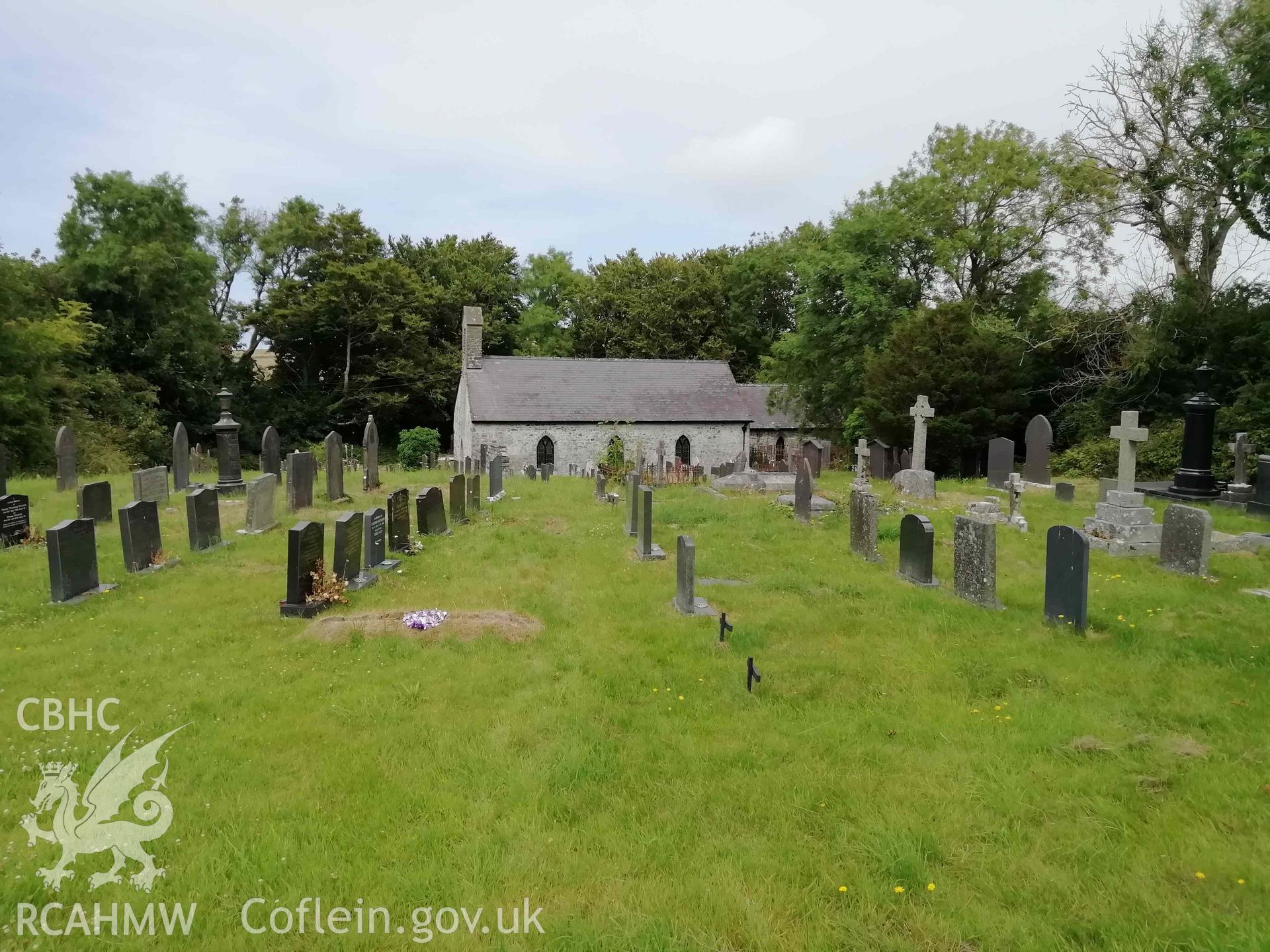 Digital colour photograph showing St Tysilio's Church and cemetery.