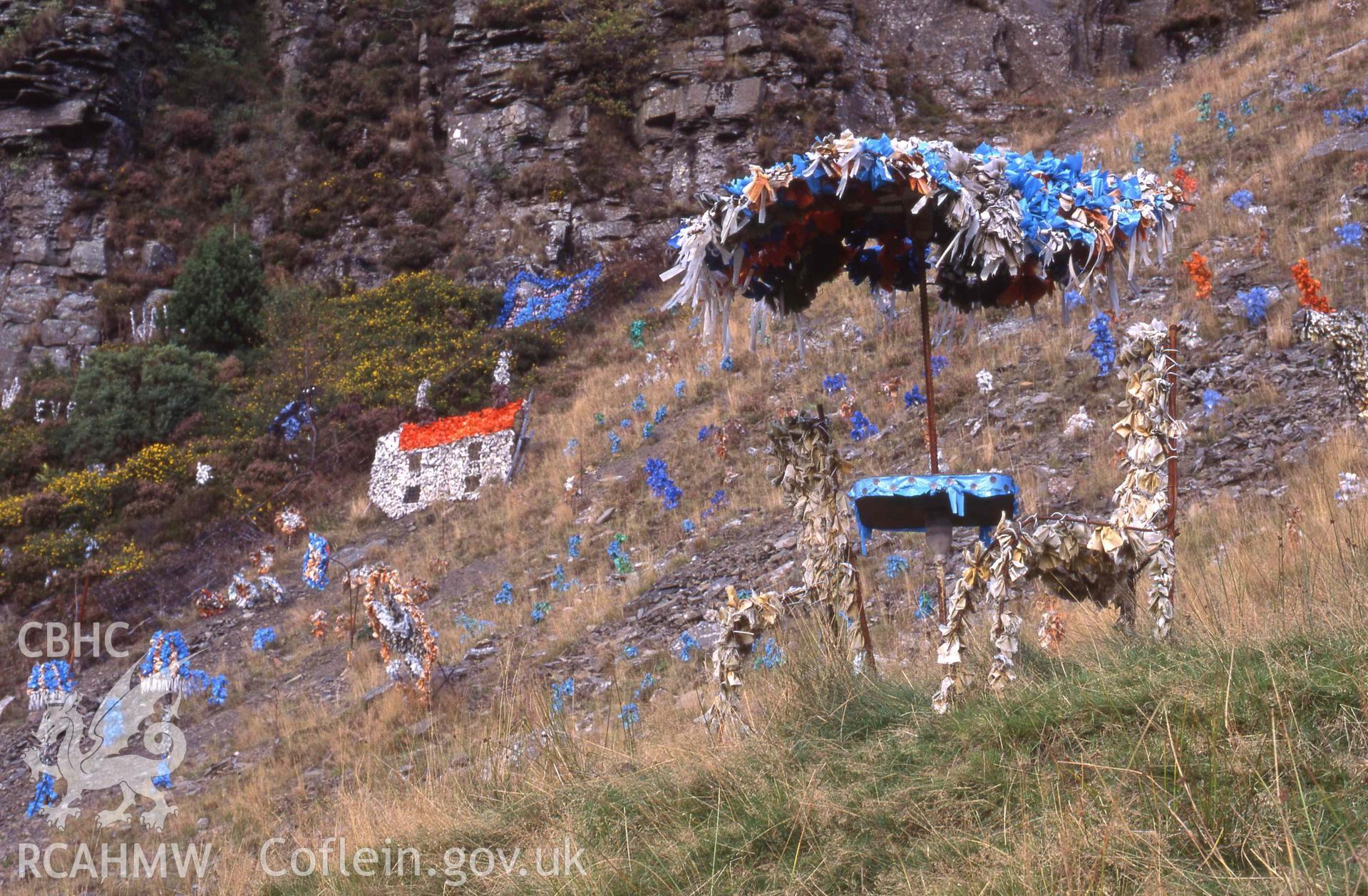 Photograph showing artworks at the Watchmans' Huts, Treherbert. Previously shown in an exhibition in Treorchy Library in 2020. Photographed by Patricia Aithie.