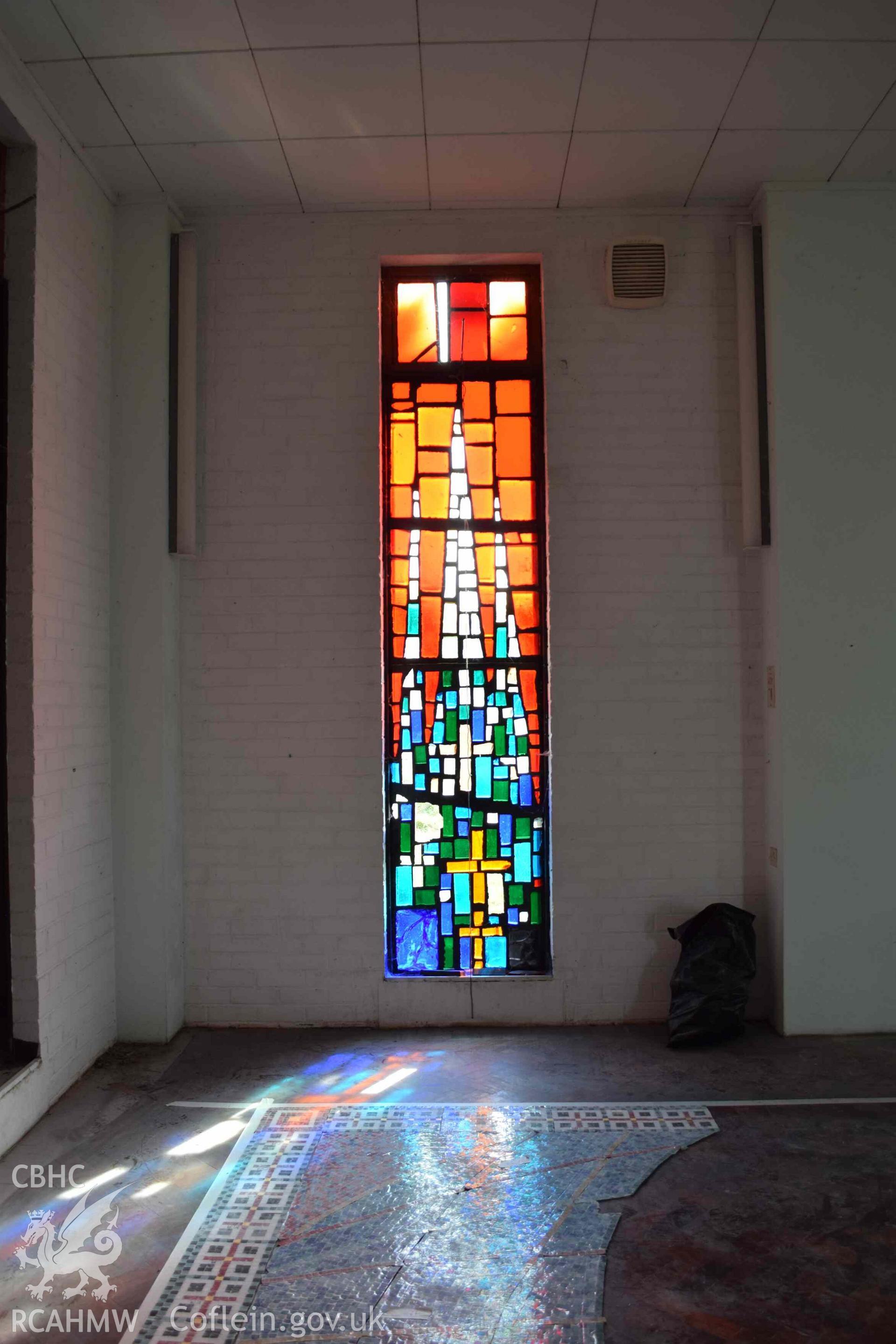 Photograph showing a Jonah Jones Dalle de Verre window (10a), at the church of The Resurrection of Our Saviour, Morfa Nefyn, taken on behalf of the Architectural Glass Centre during the removal of the windows in March 2019.