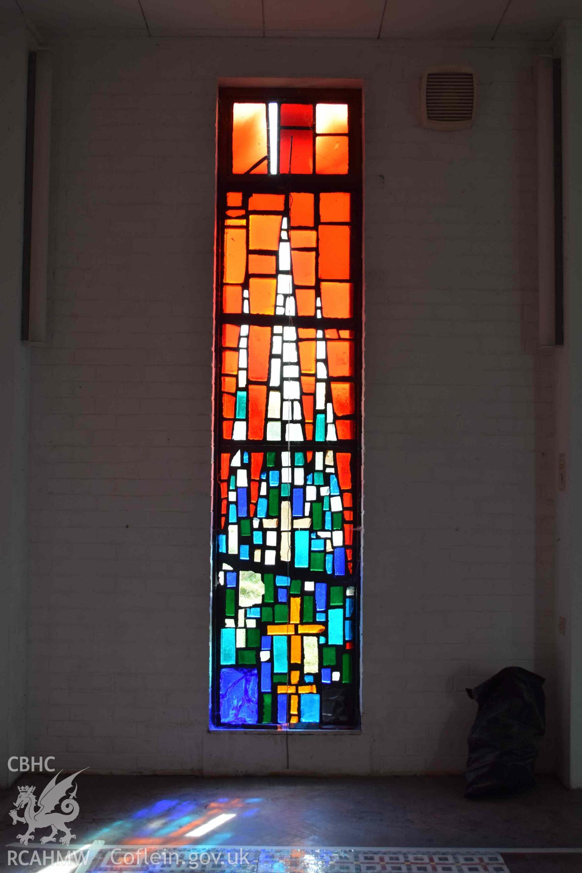 Photograph showing a Jonah Jones Dalle de Verre window (10c), at the church of The Resurrection of Our Saviour, Morfa Nefyn, taken on behalf of the Architectural Glass Centre during the removal of the windows in March 2019.