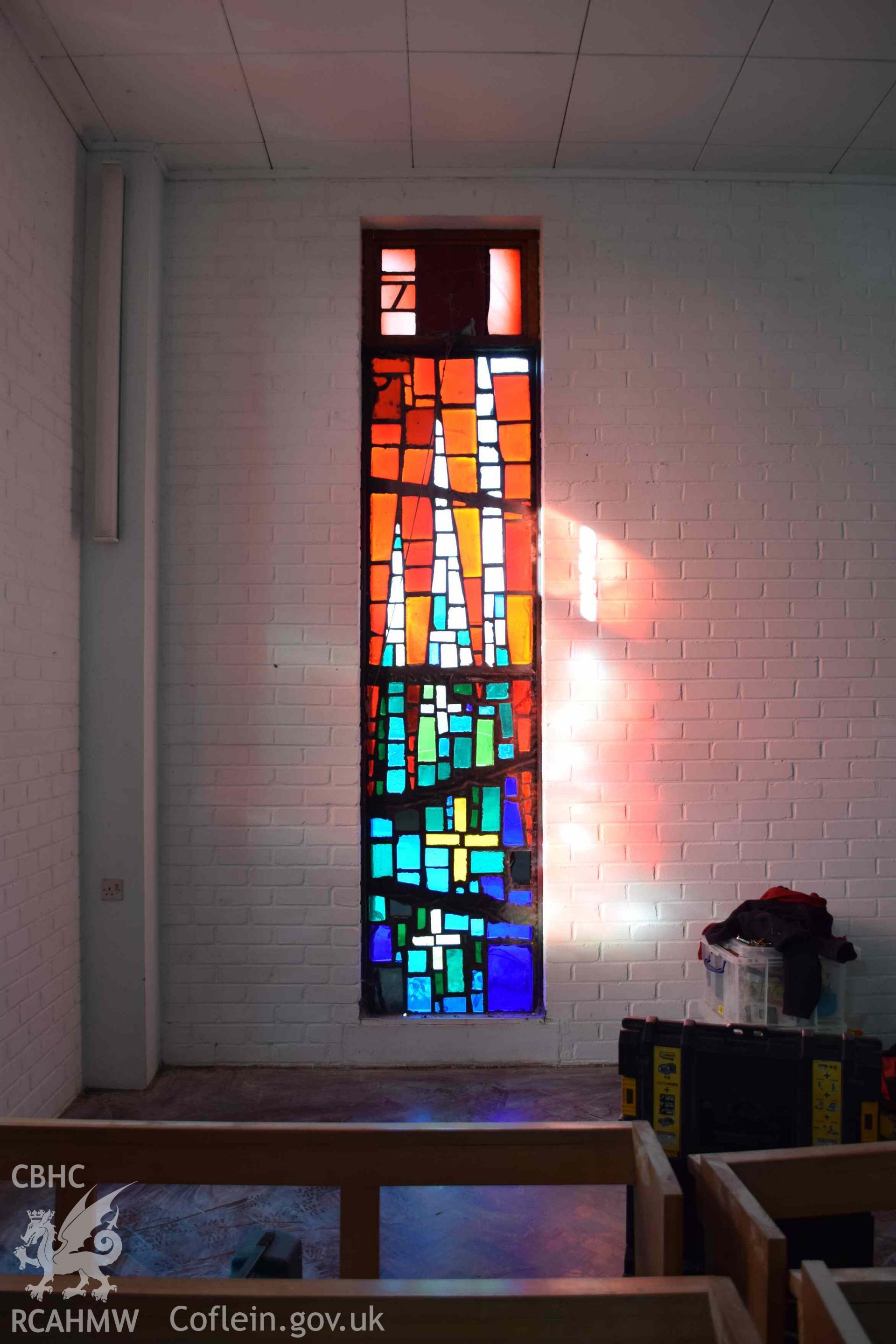 Photograph showing a Jonah Jones Dalle de Verre window (12a), at the church of The Resurrection of Our Saviour, Morfa Nefyn, taken on behalf of the Architectural Glass Centre during the removal of the windows in March 2019.