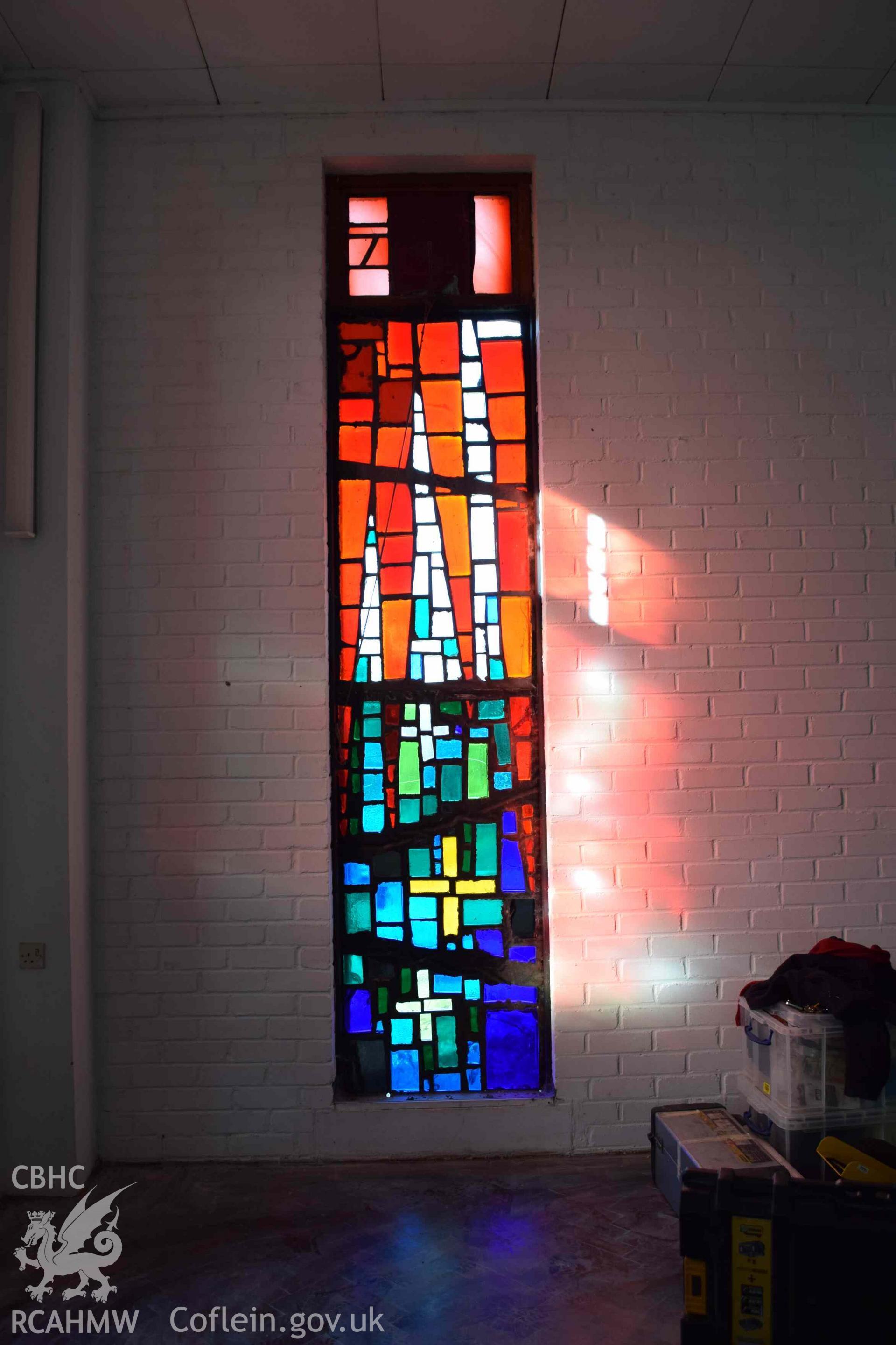 Photograph showing a Jonah Jones Dalle de Verre window (12b), at the church of The Resurrection of Our Saviour, Morfa Nefyn, taken on behalf of the Architectural Glass Centre during the removal of the windows in March 2019.