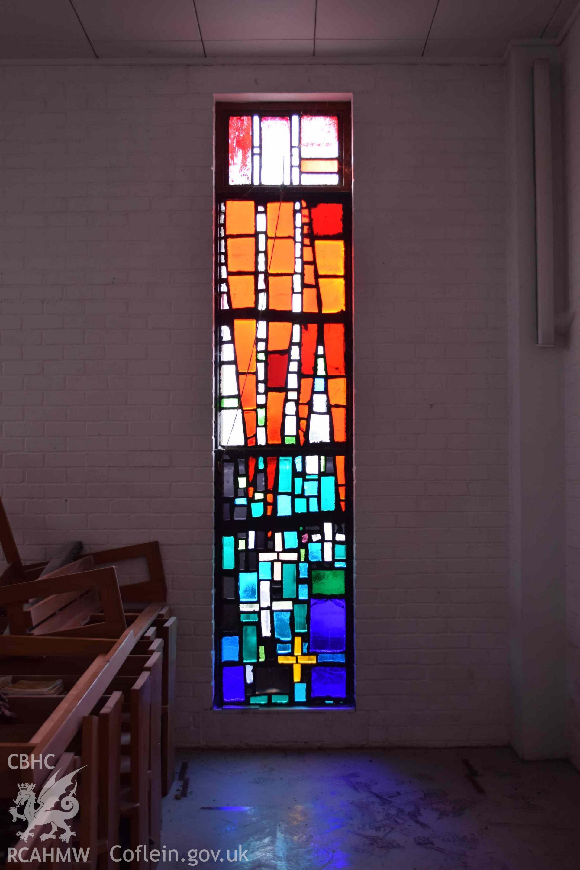 Photograph showing a Jonah Jones Dalle de Verre window (1c), at the church of The Resurrection of Our Saviour, Morfa Nefyn, taken on behalf of the Architectural Glass Centre during the removal of the windows in March 2019.