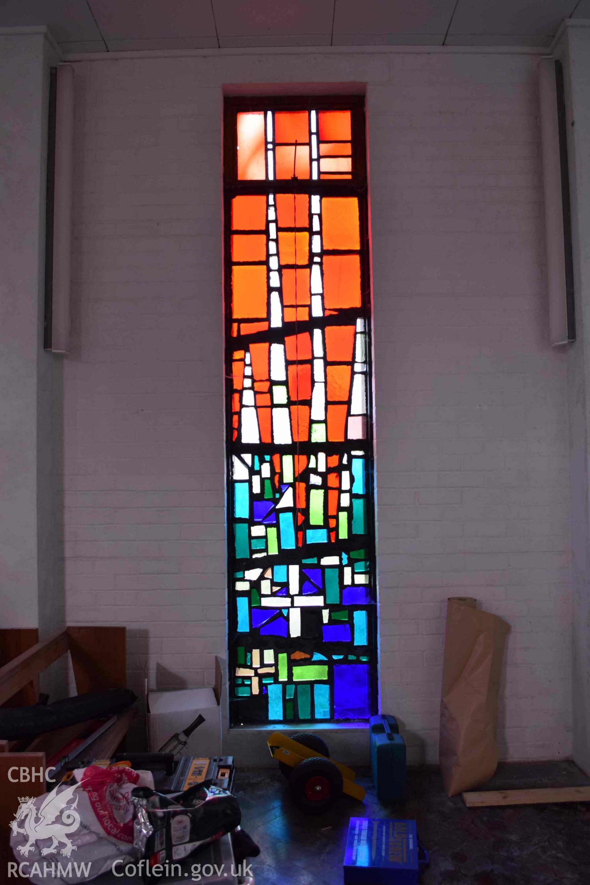 Photograph showing a Jonah Jones Dalle de Verre window (3c), at the church of The Resurrection of Our Saviour, Morfa Nefyn, taken on behalf of the Architectural Glass Centre during the removal of the windows in March 2019.