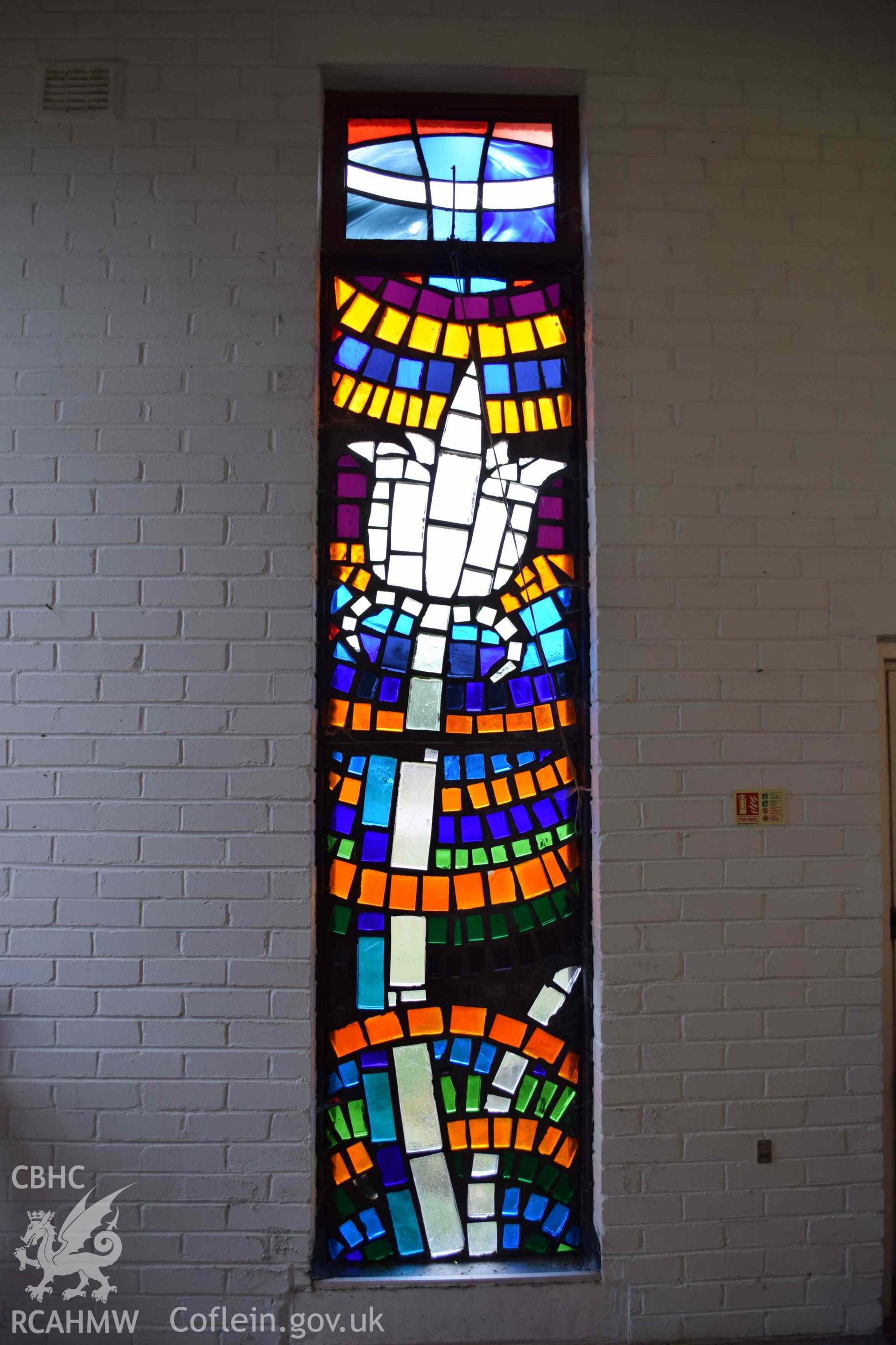 Photograph showing a Jonah Jones Dalle de Verre window (8b), at the church of The Resurrection of Our Saviour, Morfa Nefyn, taken on behalf of the Architectural Glass Centre during the removal of the windows in March 2019.